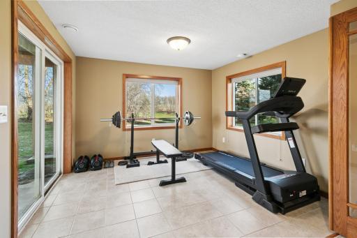 Lower Level Workout Area with Tiled Floors