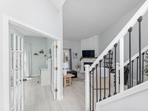 French doors open into the main level Bedroom, currently being used as a home office.