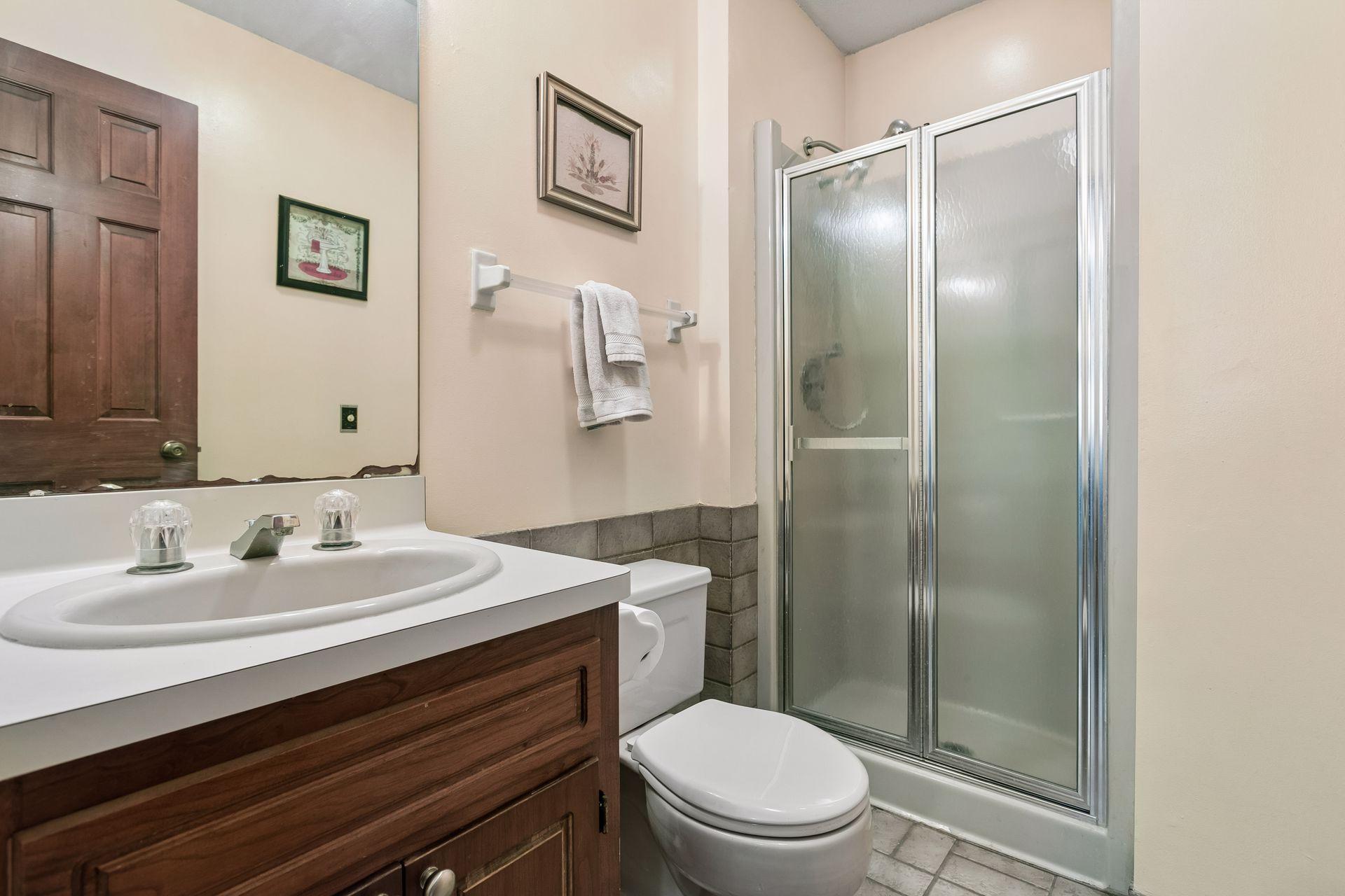 Main floor 3/4 bath off of garage and laundry room