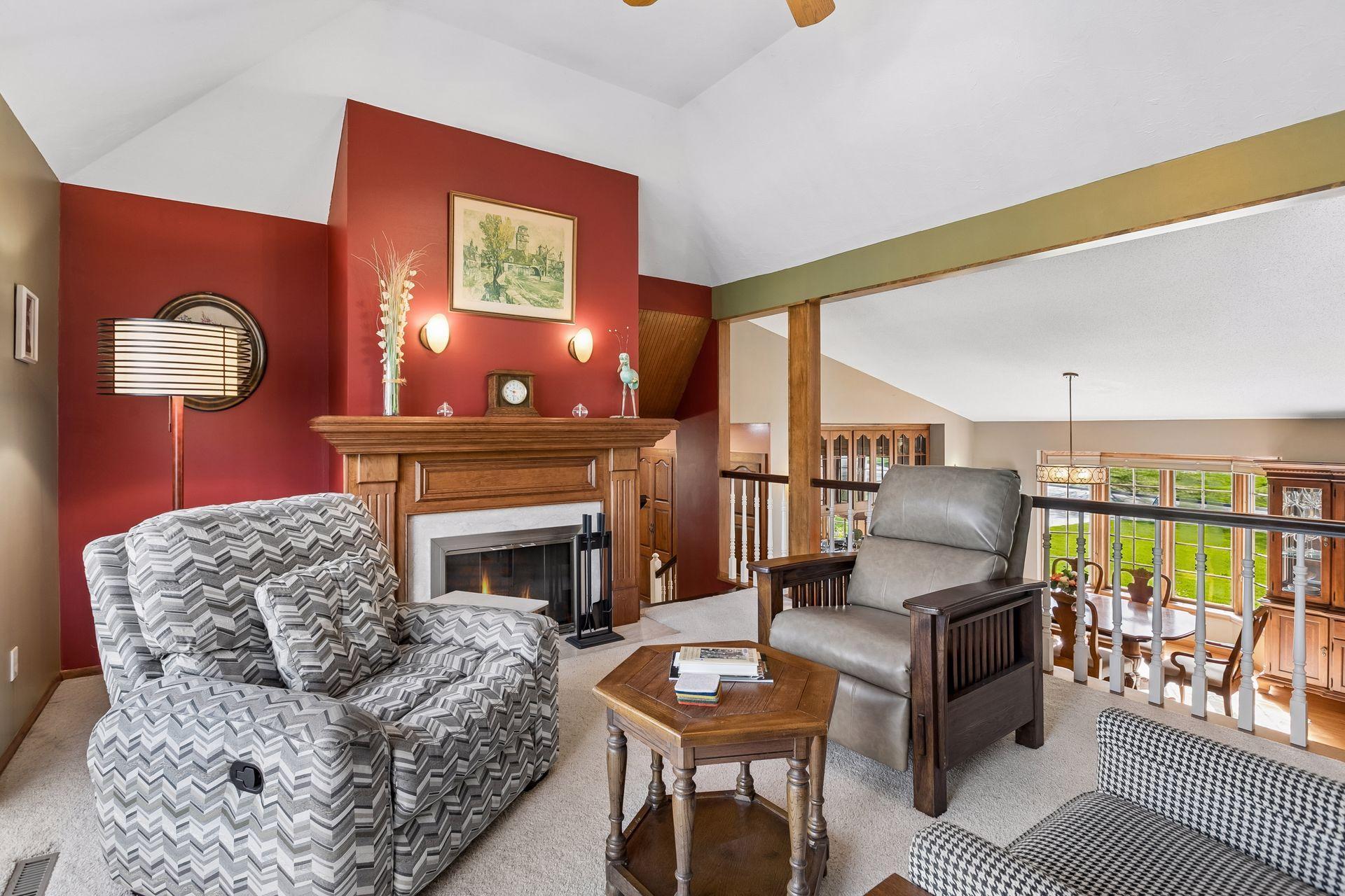 This mezzanine-like 2nd floor enjoys a tray ceiling and views of below