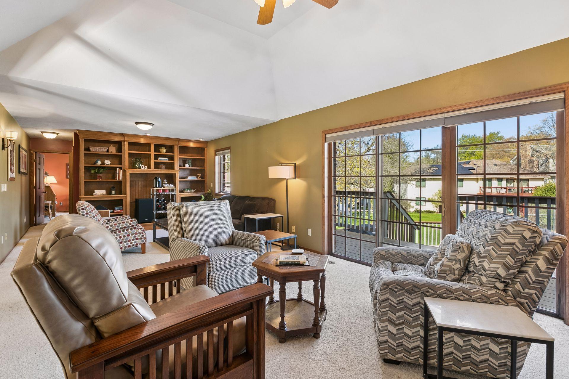 Another walkout to an upper level deck from this fabulous multi-purpose space
