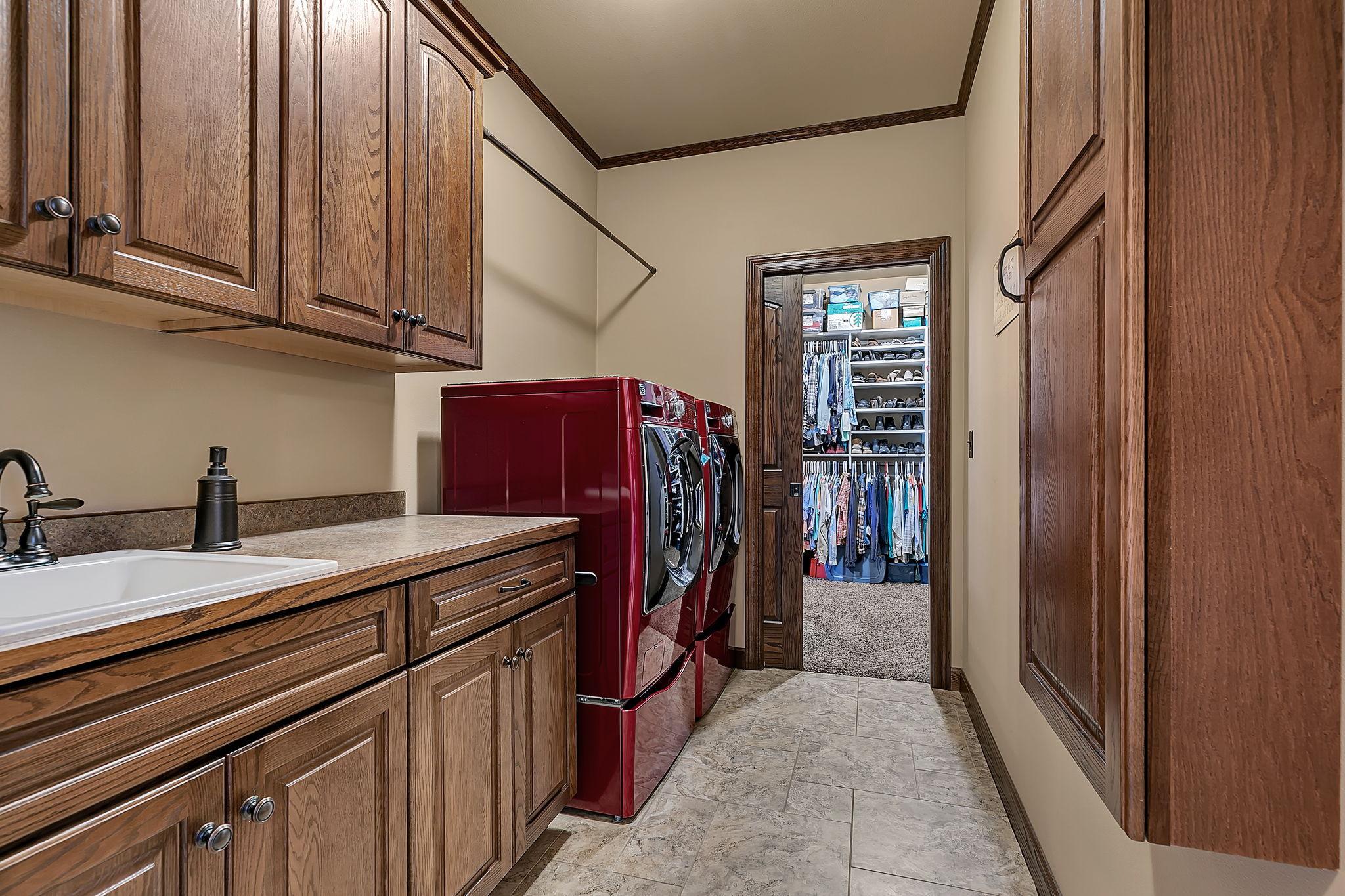Main floor laundry directly off primary suite