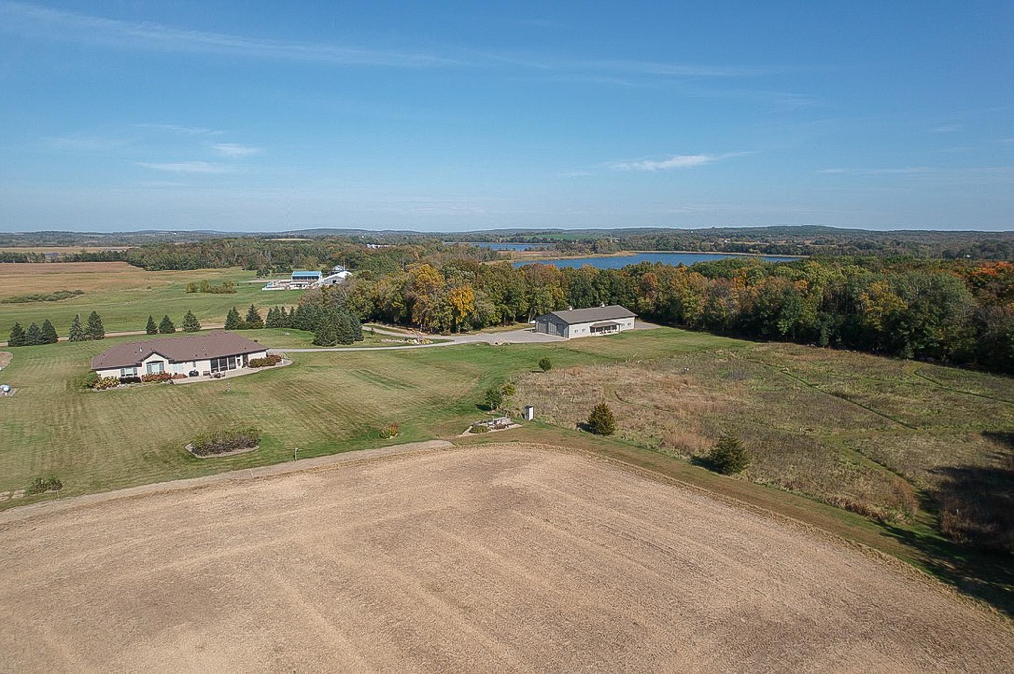 Property features a diverse mix of wildflowers, CRP grasslands, woods, tillable and manicured lawn