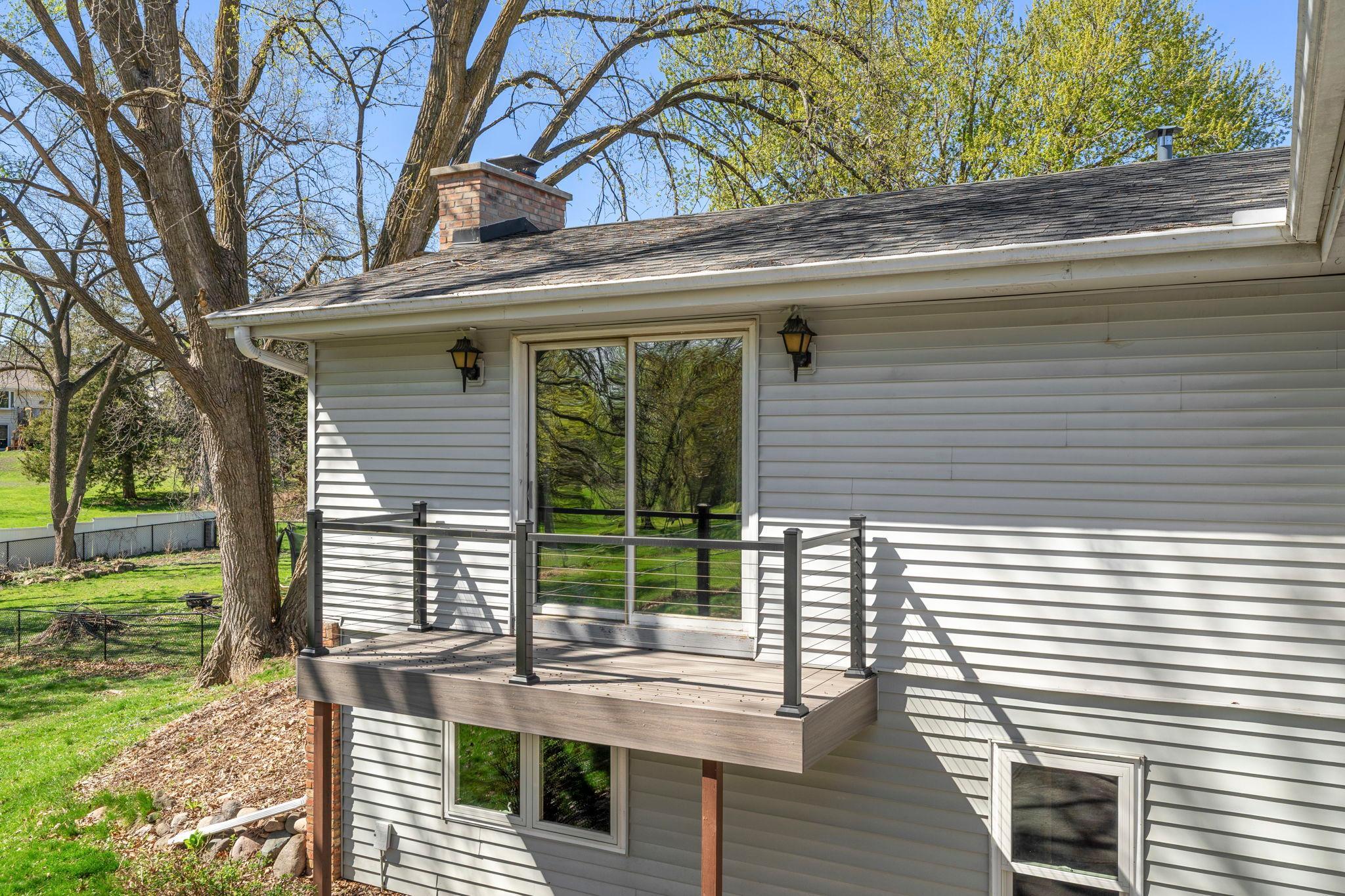 Private deck off primary bedroom - Main level