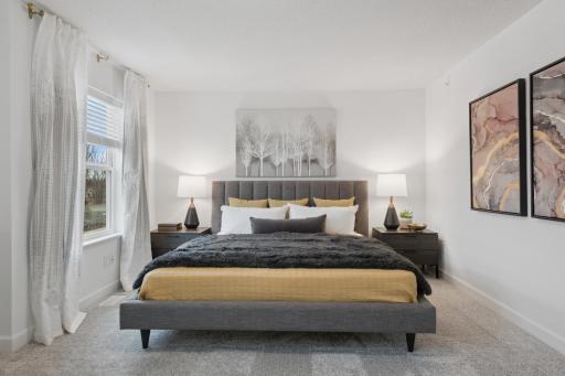 (Photo of decorated model, actual home's finishes vary) Find your retreat in this stunning owner's suite. Enjoy the exclusivity of a private bath and huge walk-in closet.