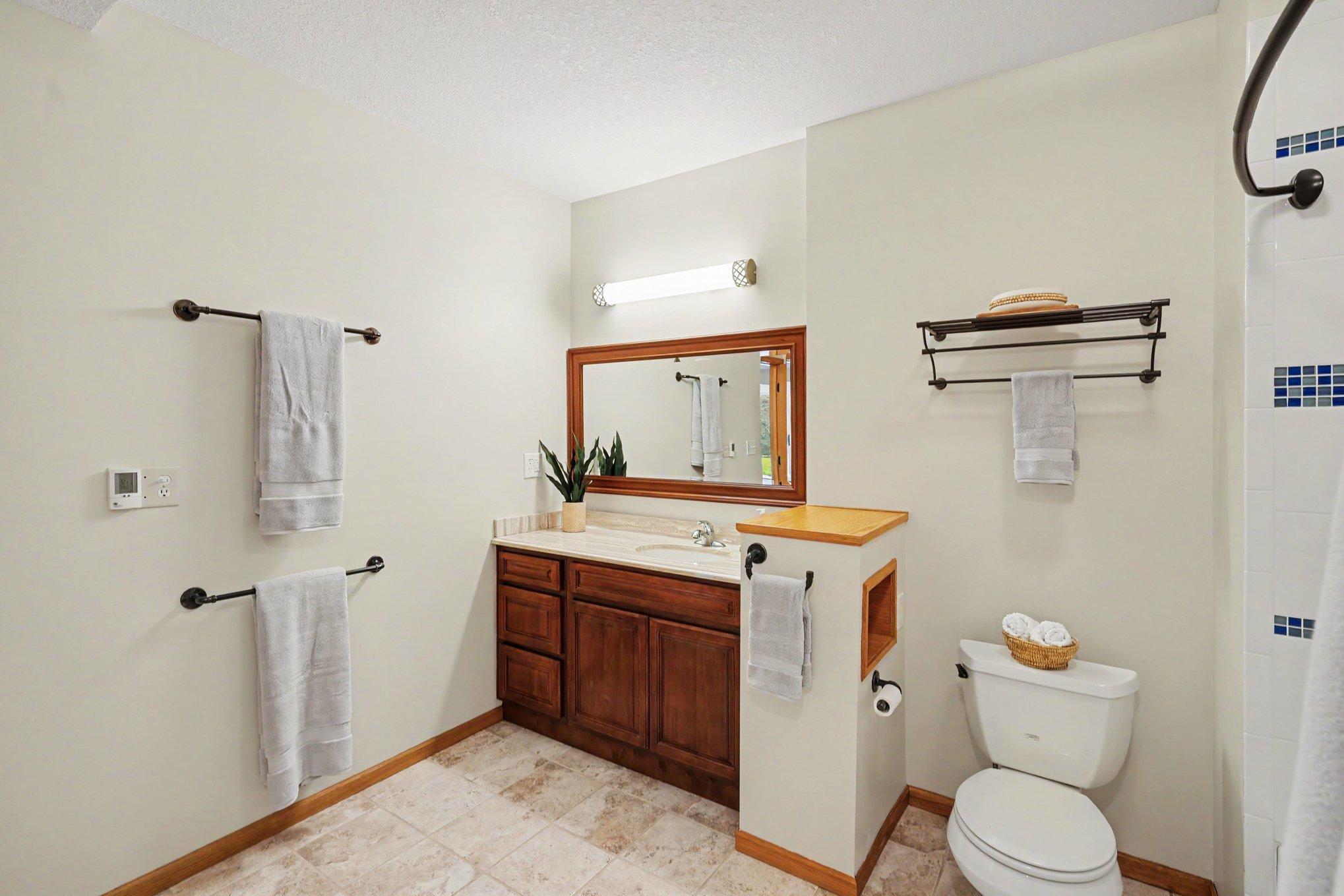 Spacious bathroom in lower level