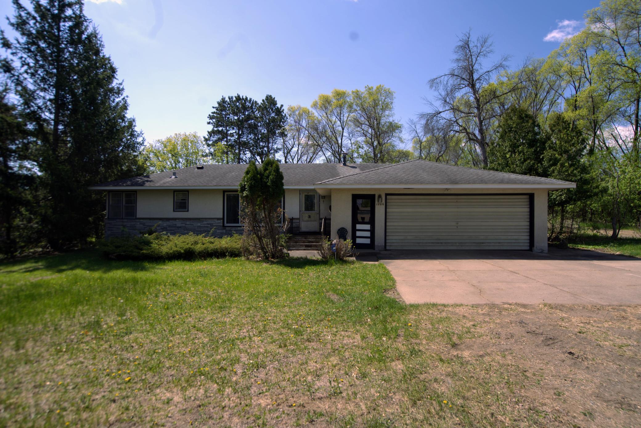 3BR/2BA one-story home in Ham Lake offering great potential near Majestic Oaks Golf Course and Bunker Hills Regional Park, with easy access to MN-65 for a convenient commute.