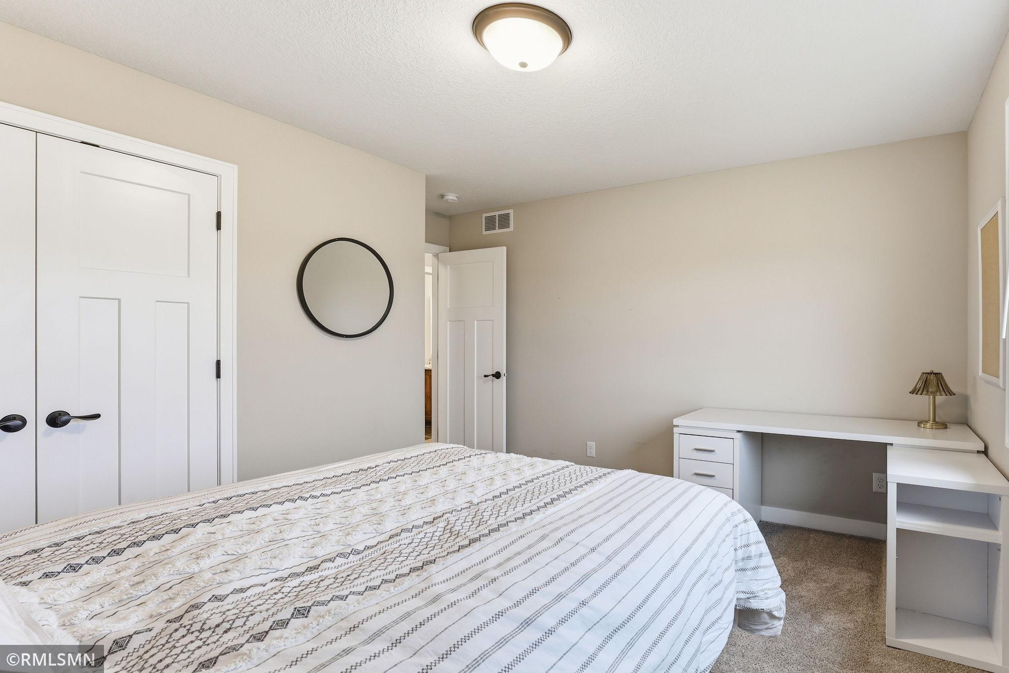 Work, study, or relax in a flexible bedroom with space for a desk and storage. Set up your routine, stay organized, and make the room your own.