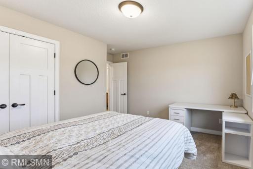 Work, study, or relax in a flexible bedroom with space for a desk and storage. Set up your routine, stay organized, and make the room your own.