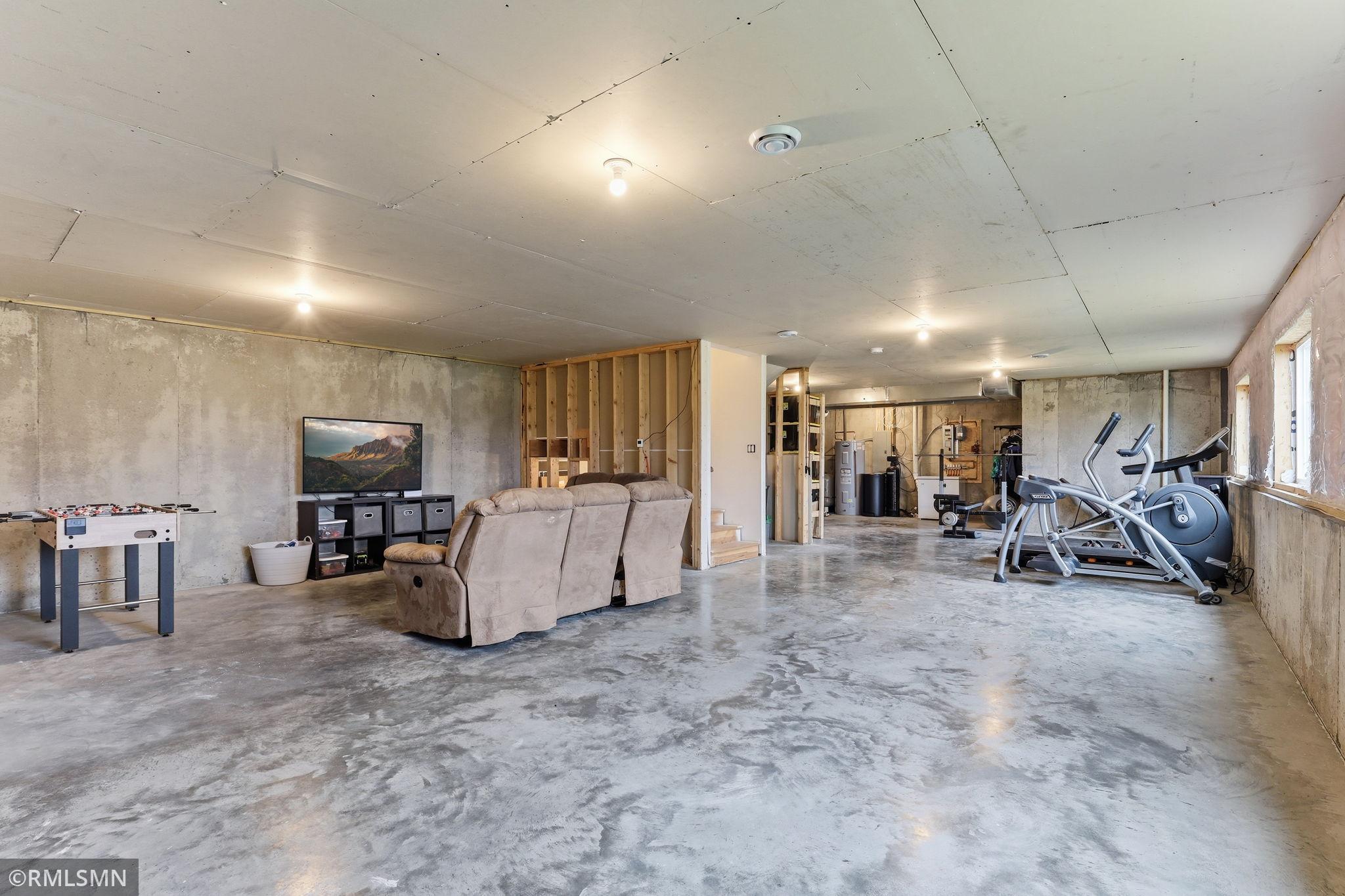 Design and build your ideal lower level with expansive open space ready for a rec room, theater, or game area. Plenty of space to bring your vision to life.