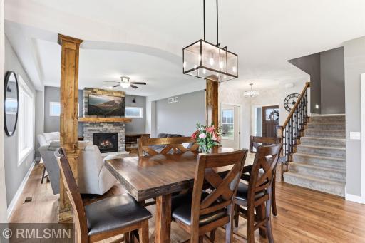Enjoy a seamless connection between the dining and living areas, perfect for hosting and everyday living. Gather around the table, then relax by the fireplace, all within an open and inviting layout filled with natural light.