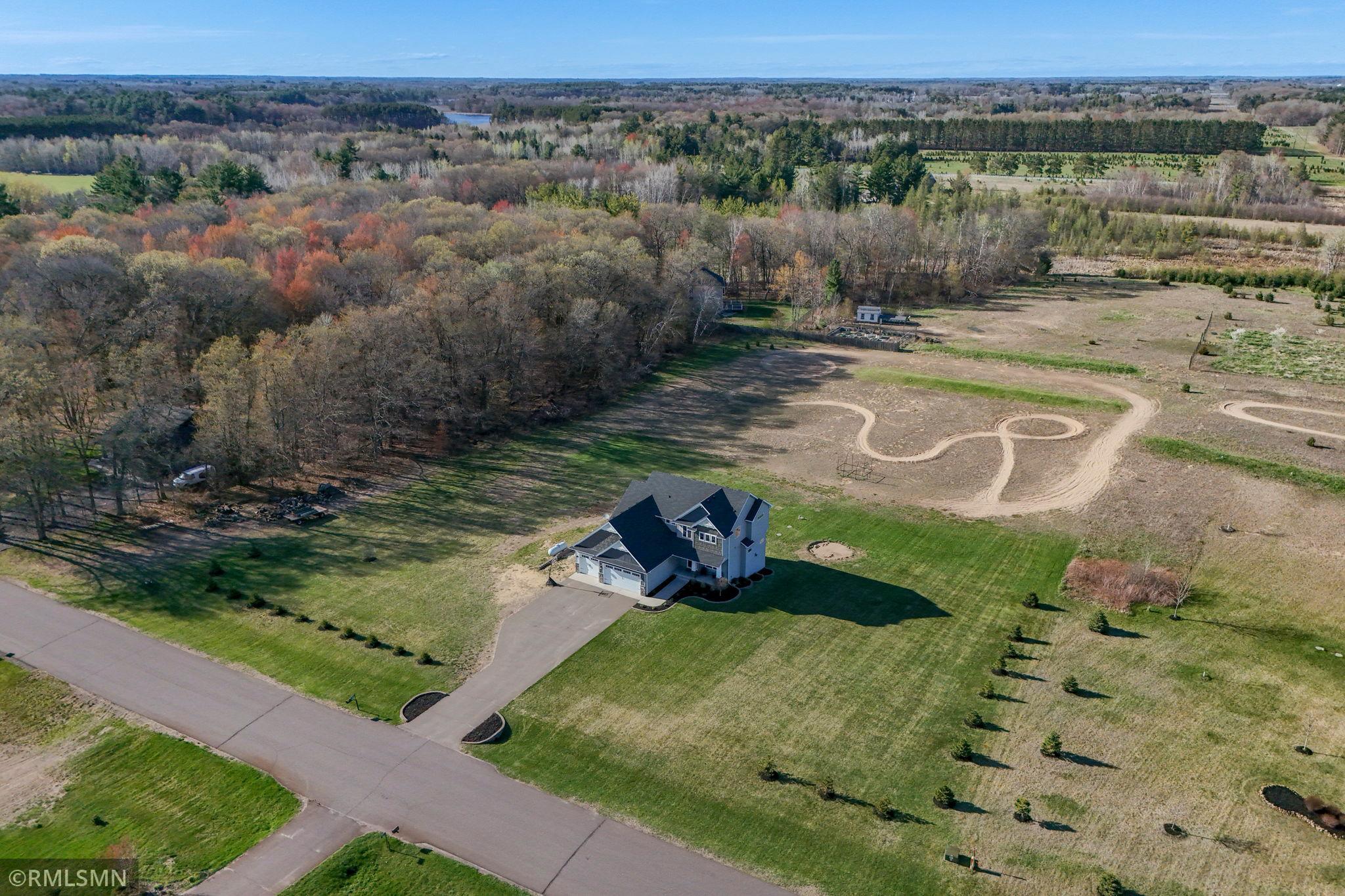 Set up outdoor activities, play freely, and make the most of the open space bordered by mature trees for added privacy.