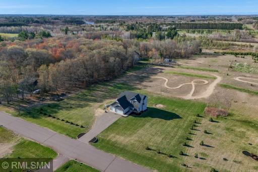Set up outdoor activities, play freely, and make the most of the open space bordered by mature trees for added privacy.