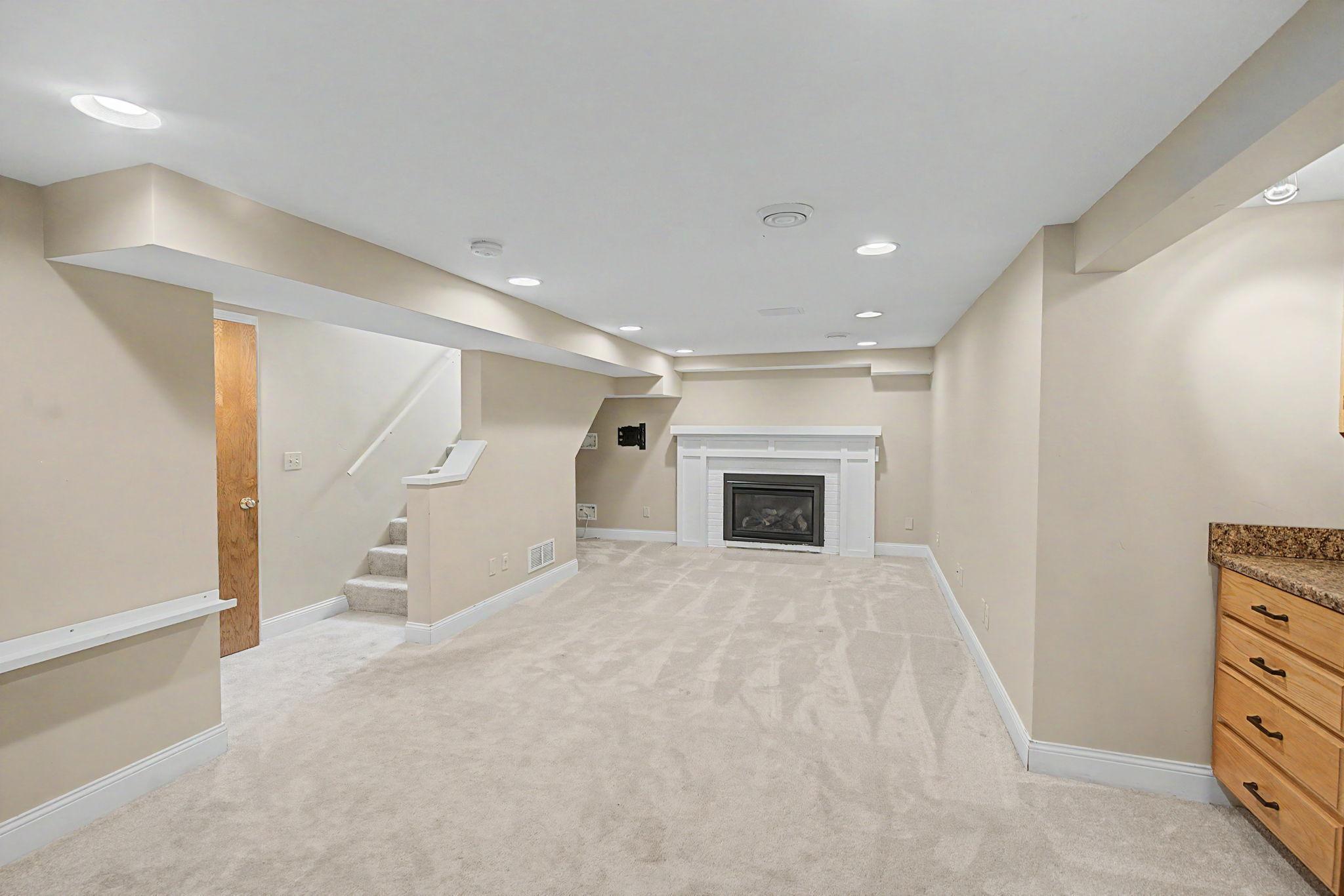 Basement Family Room with Gas Fireplace