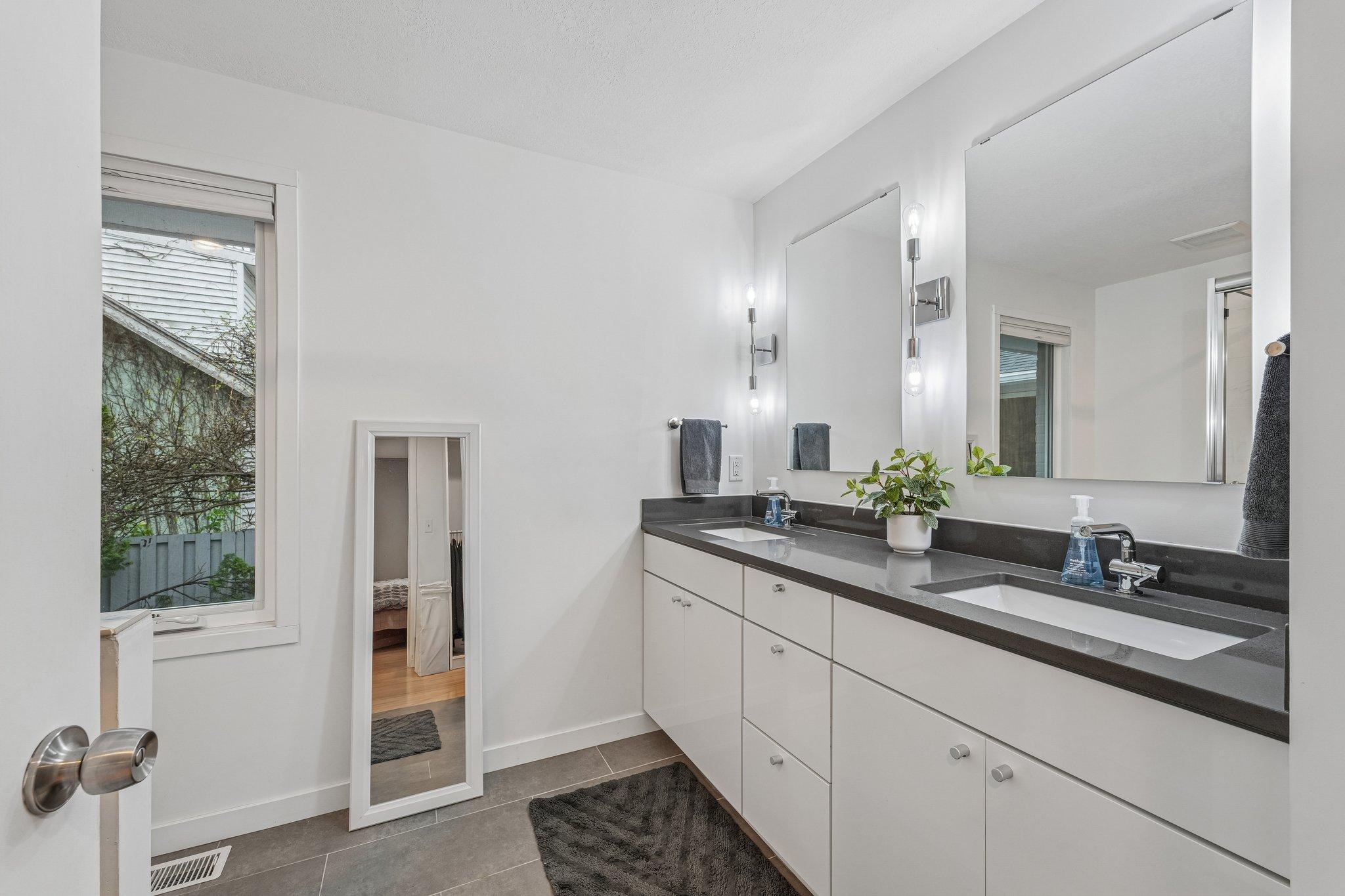 Recently created primary ensuite bath designed for modern convenience and everyday luxury.