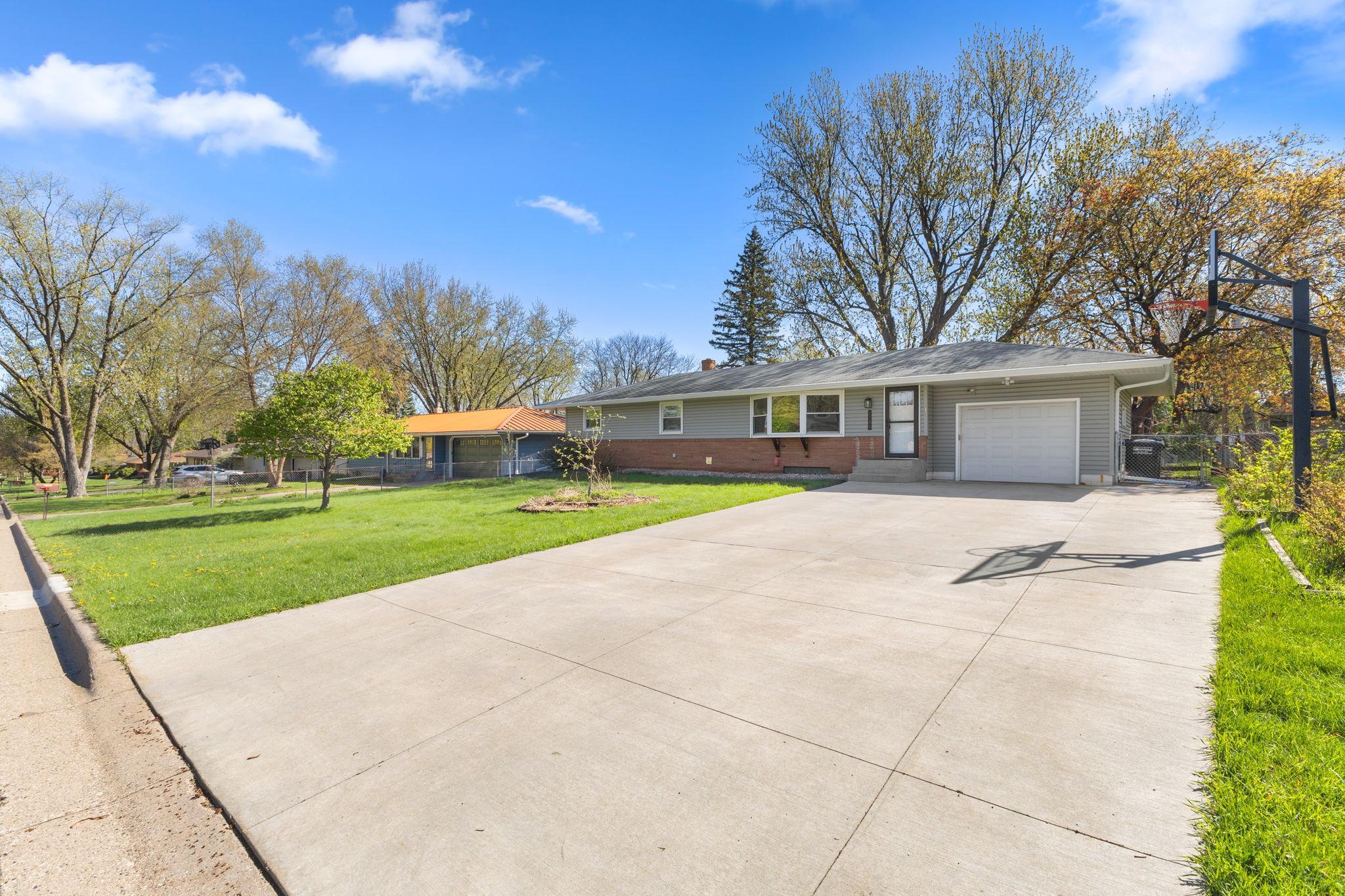 Check out this expansive asphalt double wide driveway