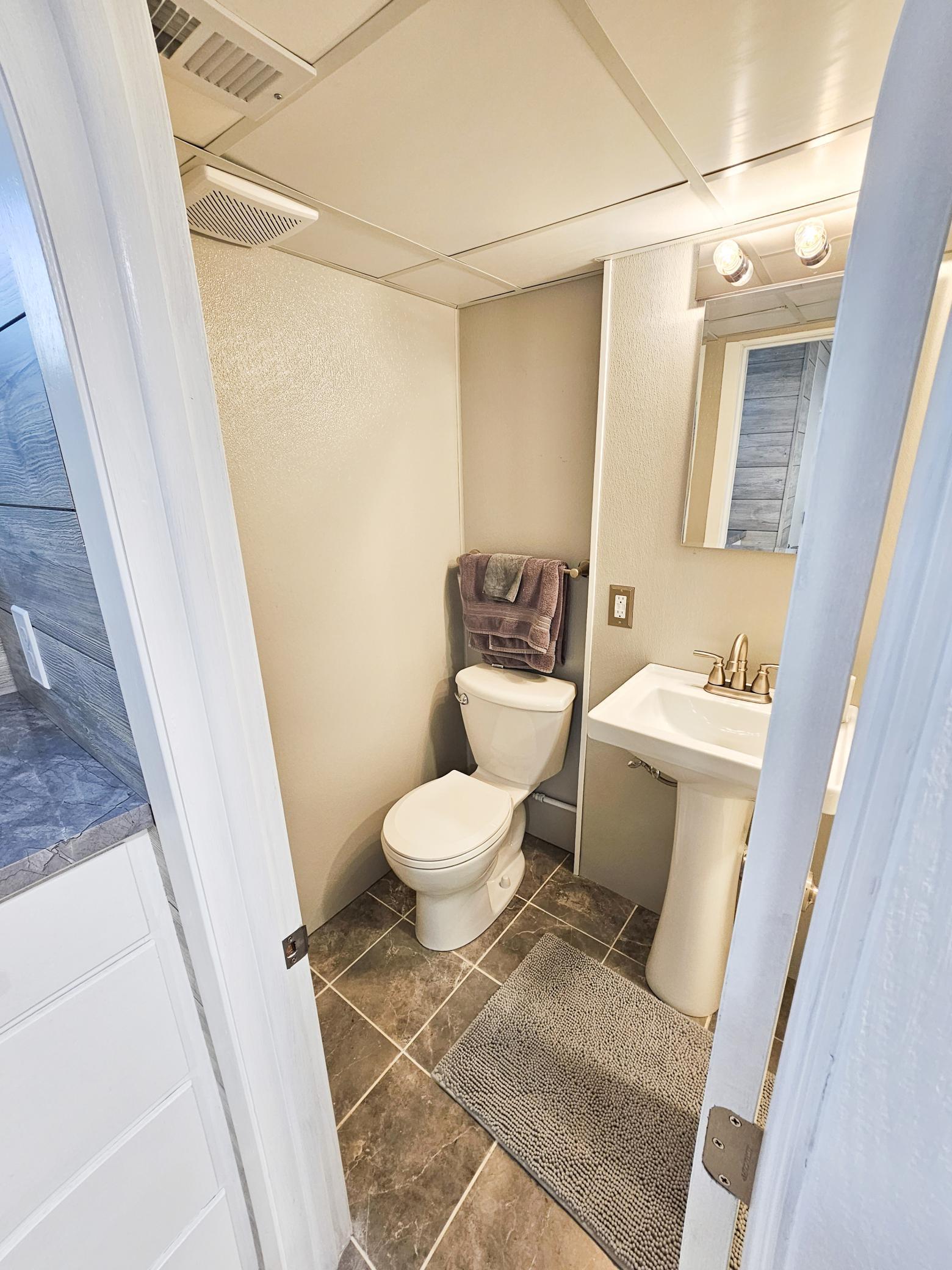 Three quarter bath features newer fixtures