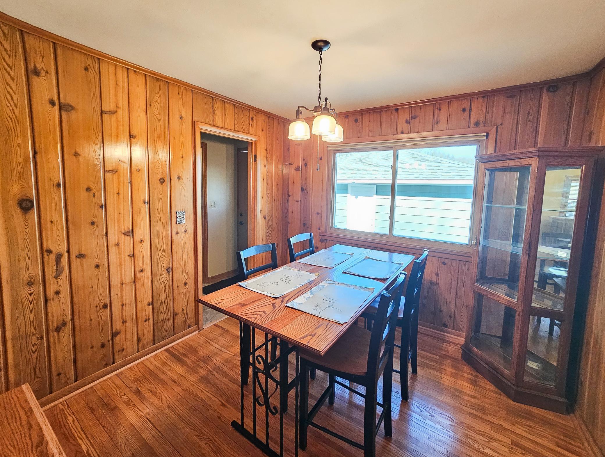 The informal dining area features hardwood floors