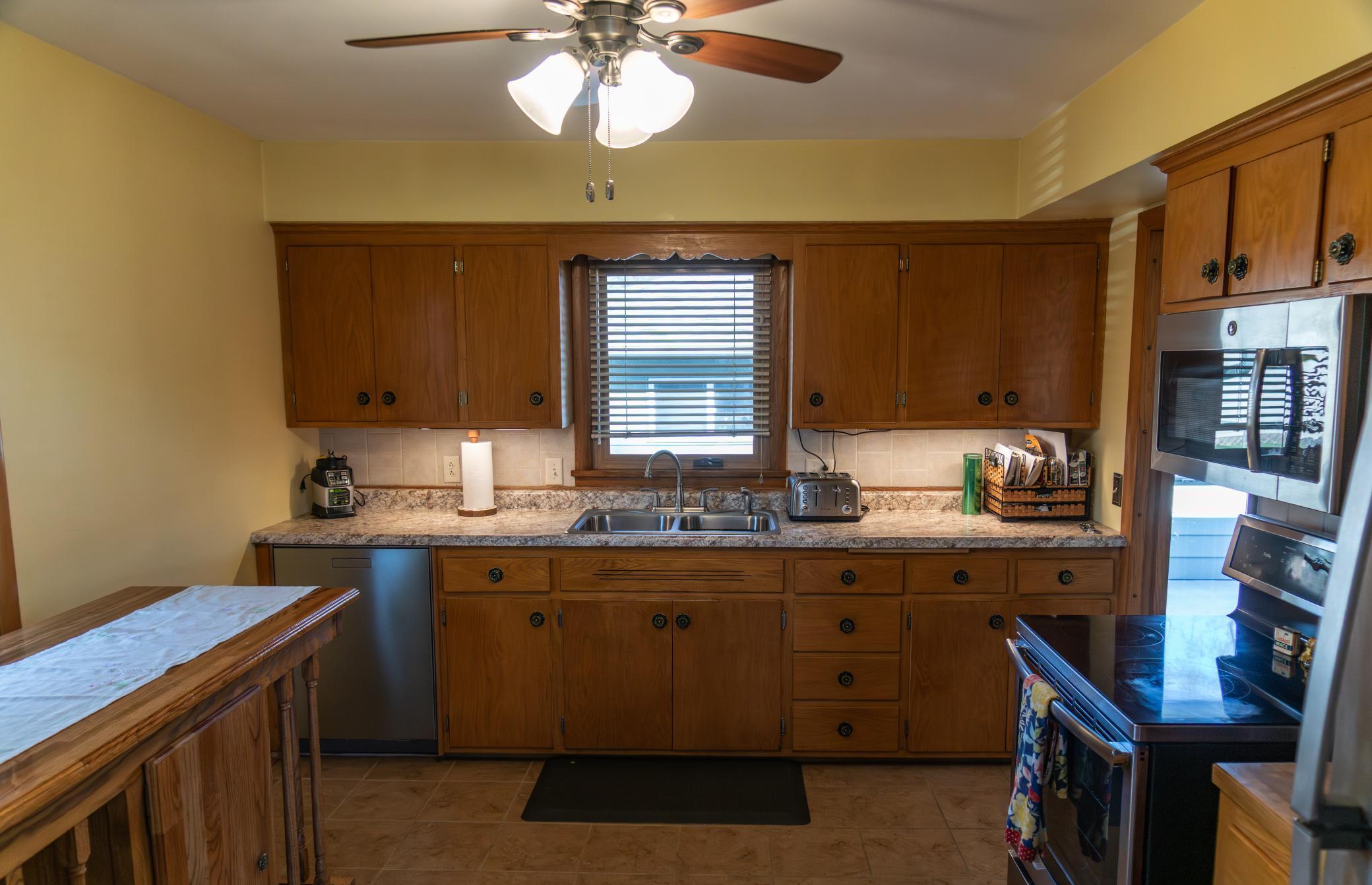 Brand new high-performance dishwasher. Two kitchen windows maximize brightness to invite the sun inside