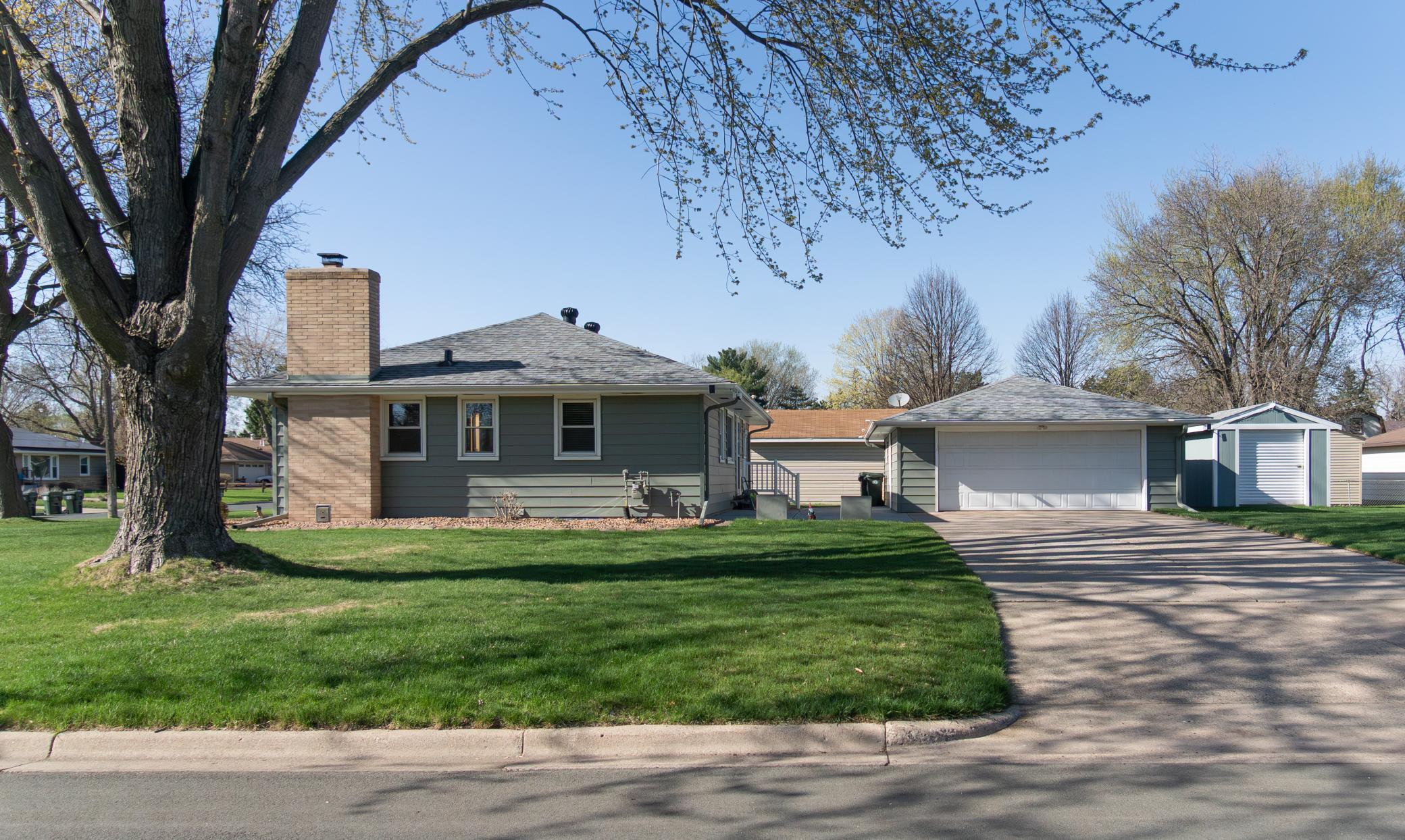 Newer steel siding, roof, patio, and front side walk