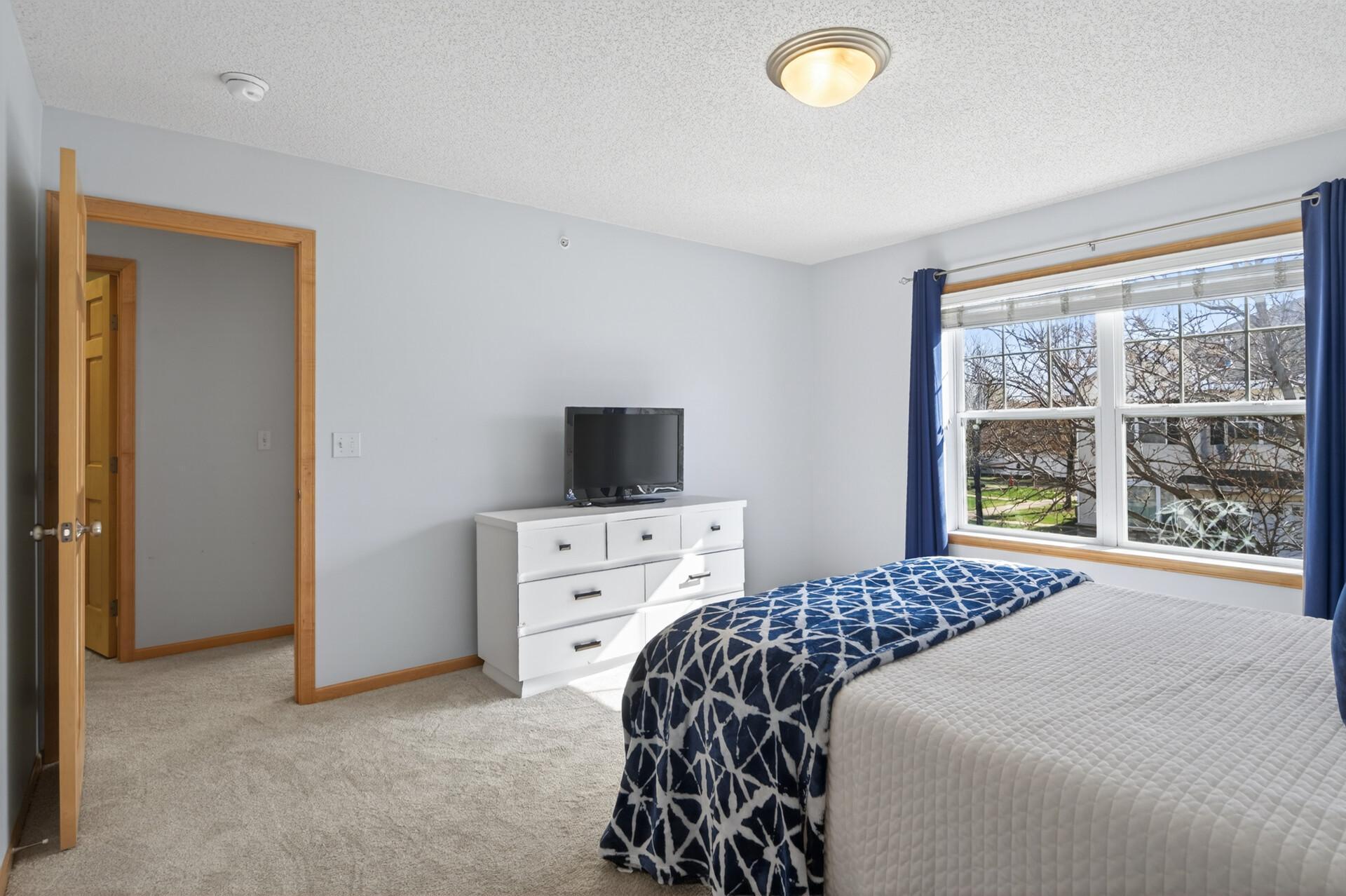 Another view of the primary bedroom.