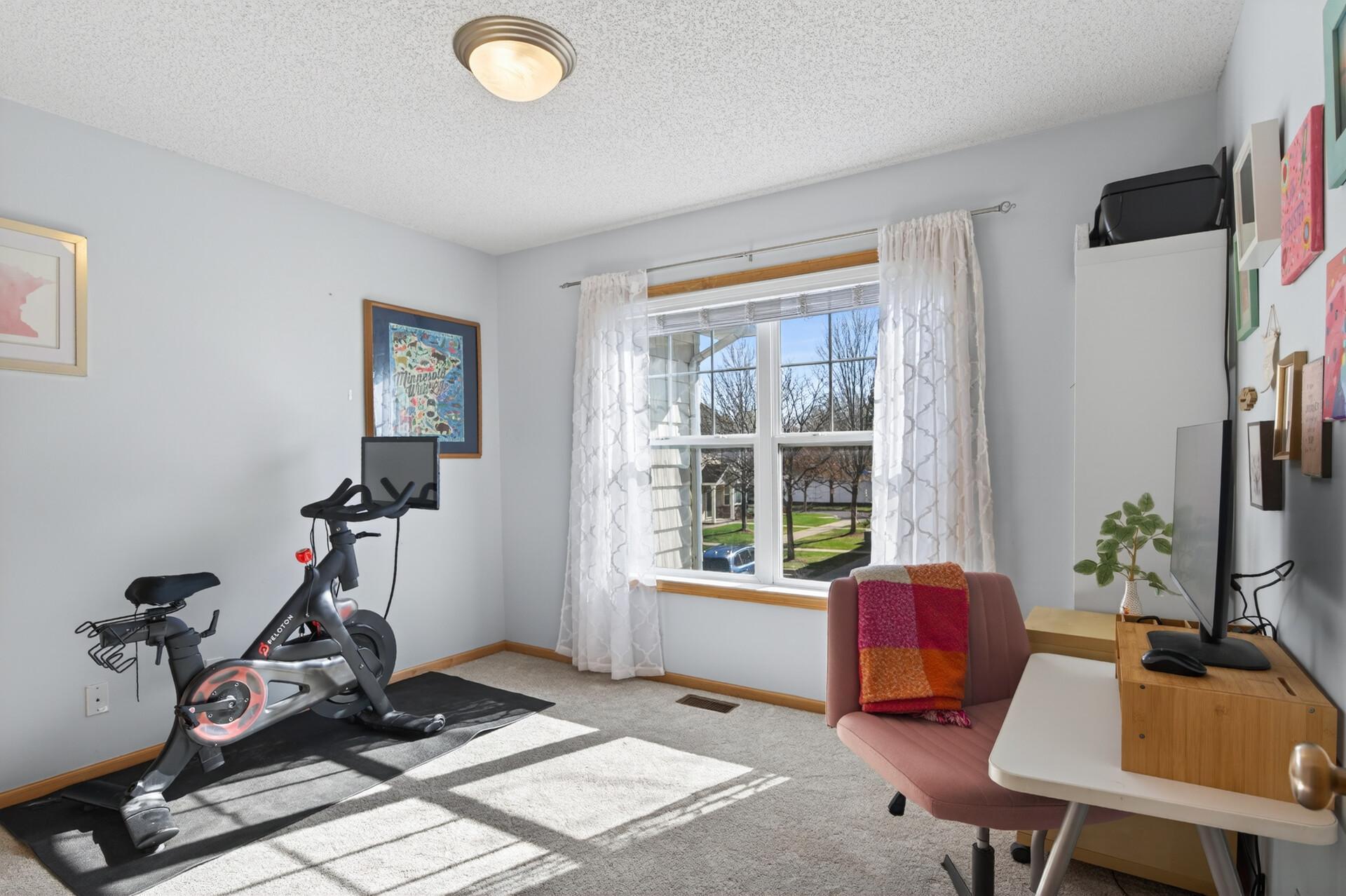 The 2nd upper level bedroom is the perfect office, guest space, or flex room!