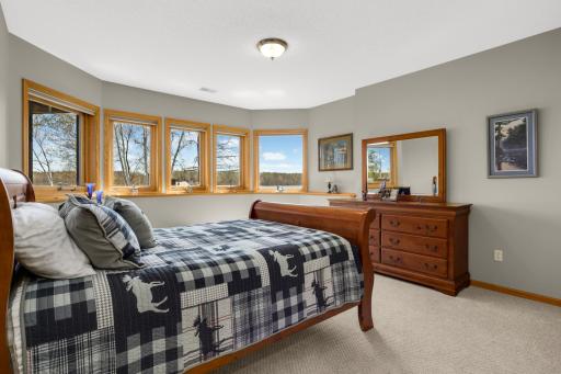 Lower level third bedroom with panoramic lookout windows