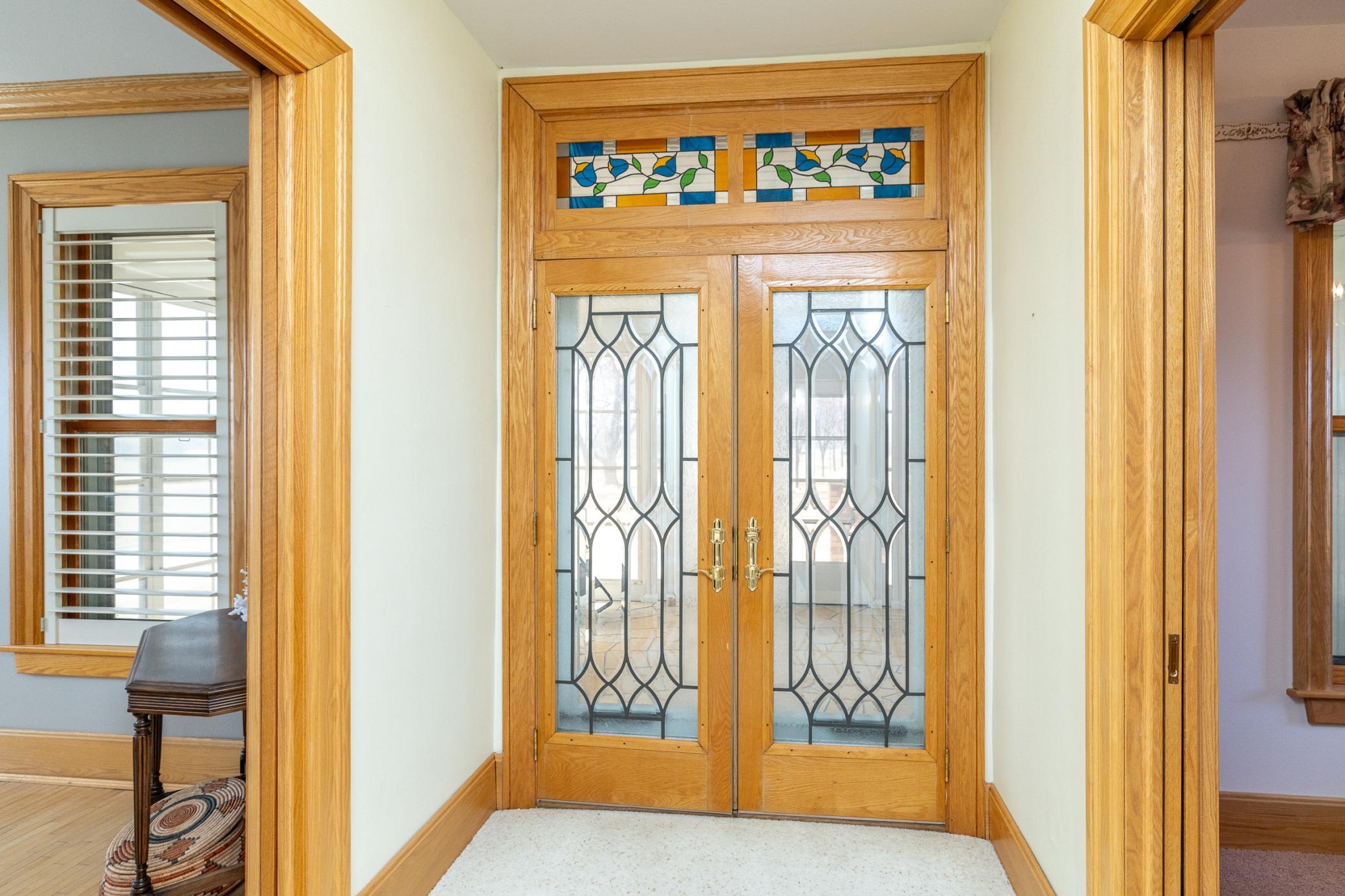 Front entry with stained glass doors