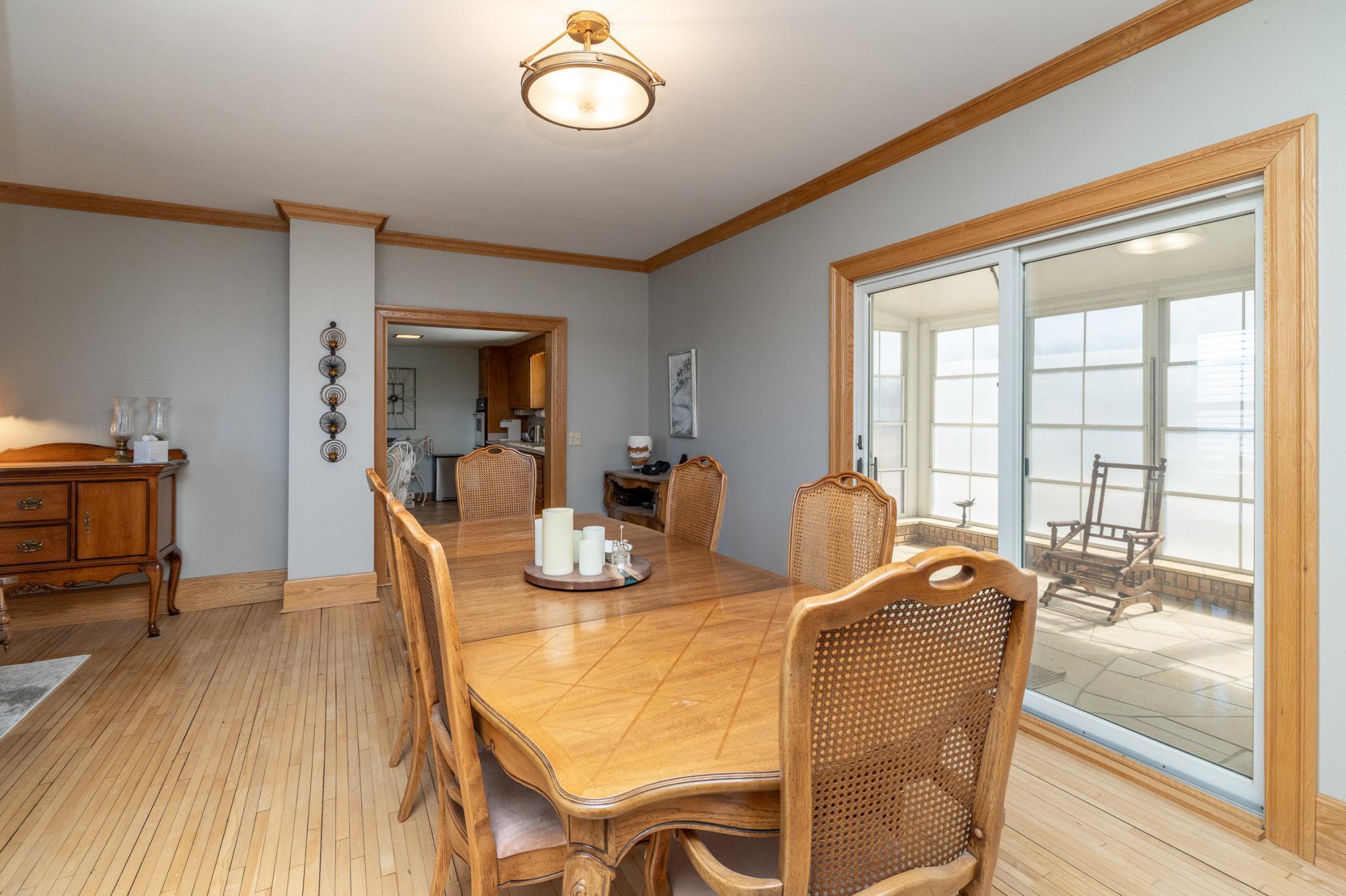Formal dining room with patio doors to south facing porch