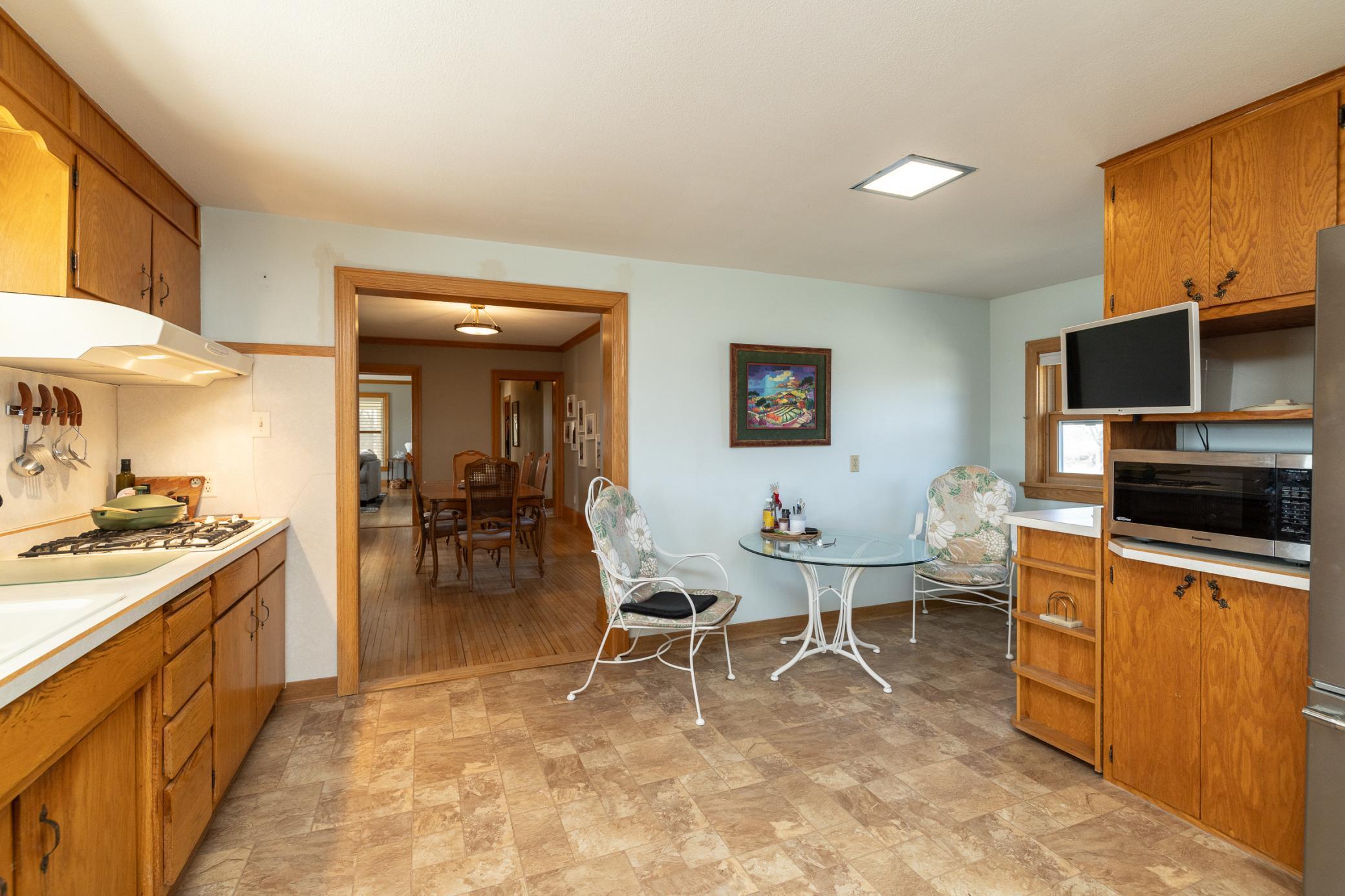 Spacious 15 x 13 open style kitchen with separate informal dining area