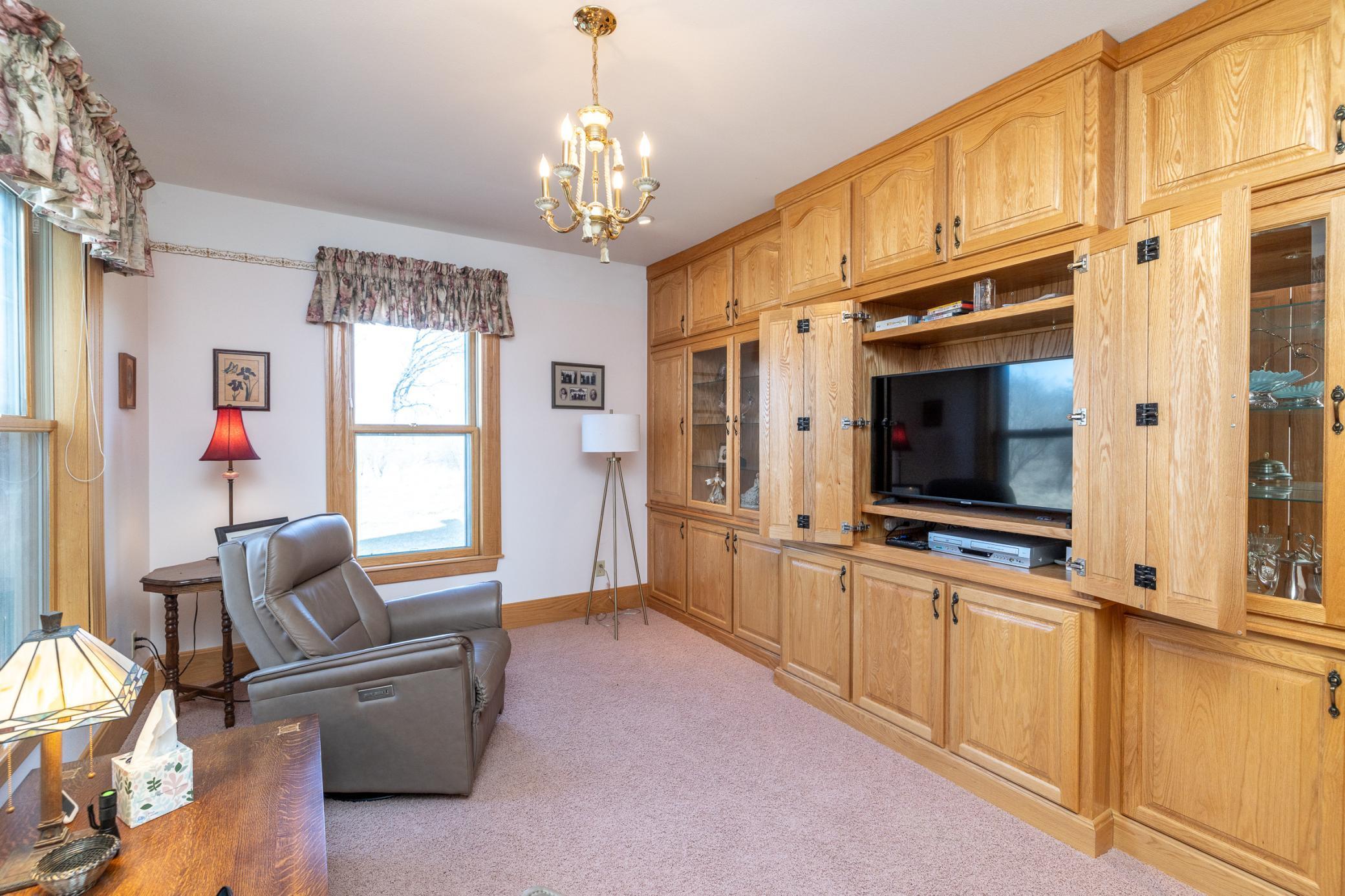 Floor to ceiling cabinets with entertainment center