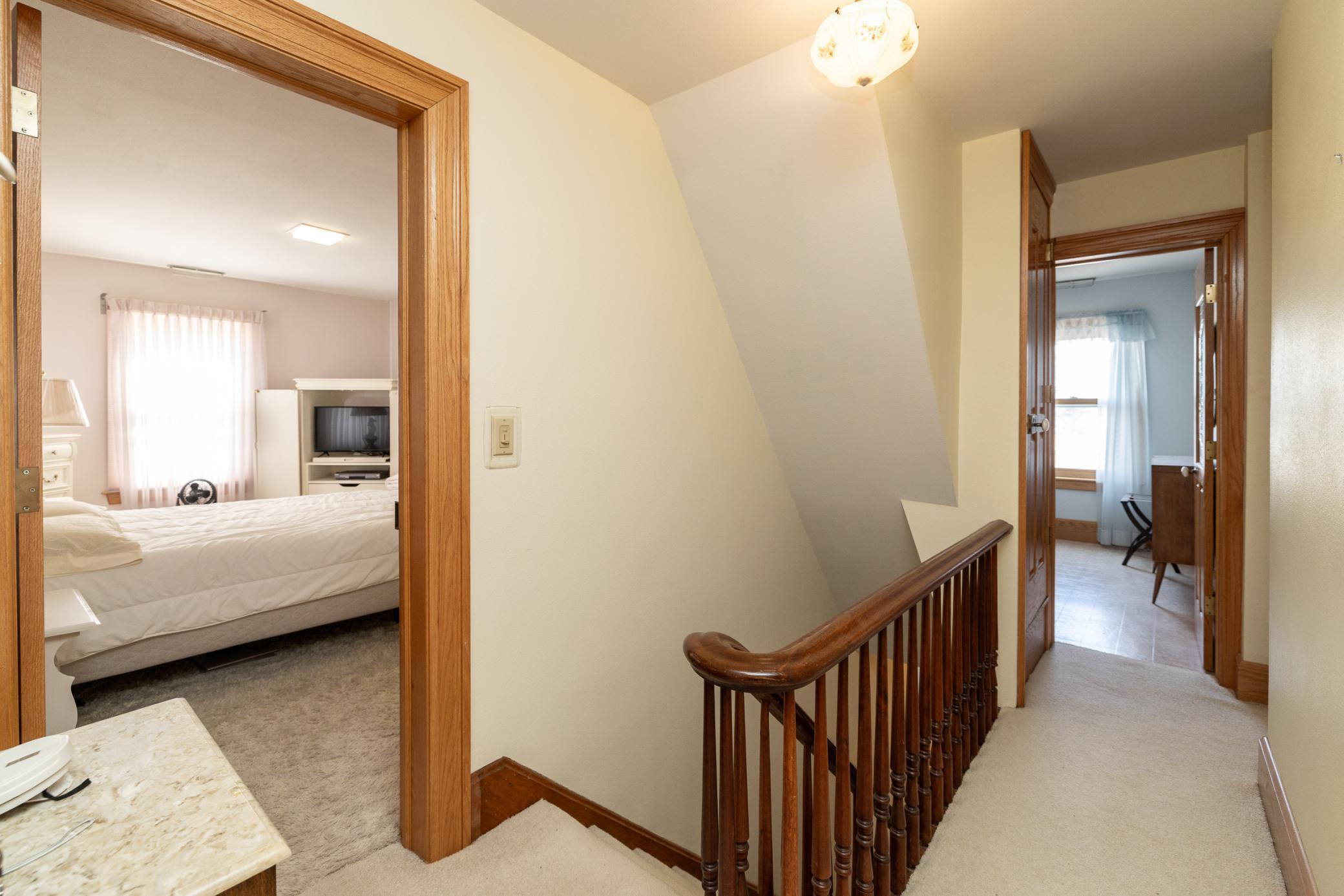 The second floor features 4 additional bedrooms, sitting room, office/den and additional full bath