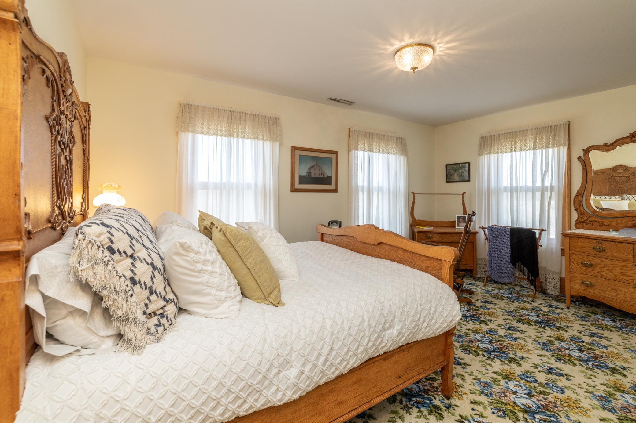 One of four upper level bedrooms which also feature cedar closets