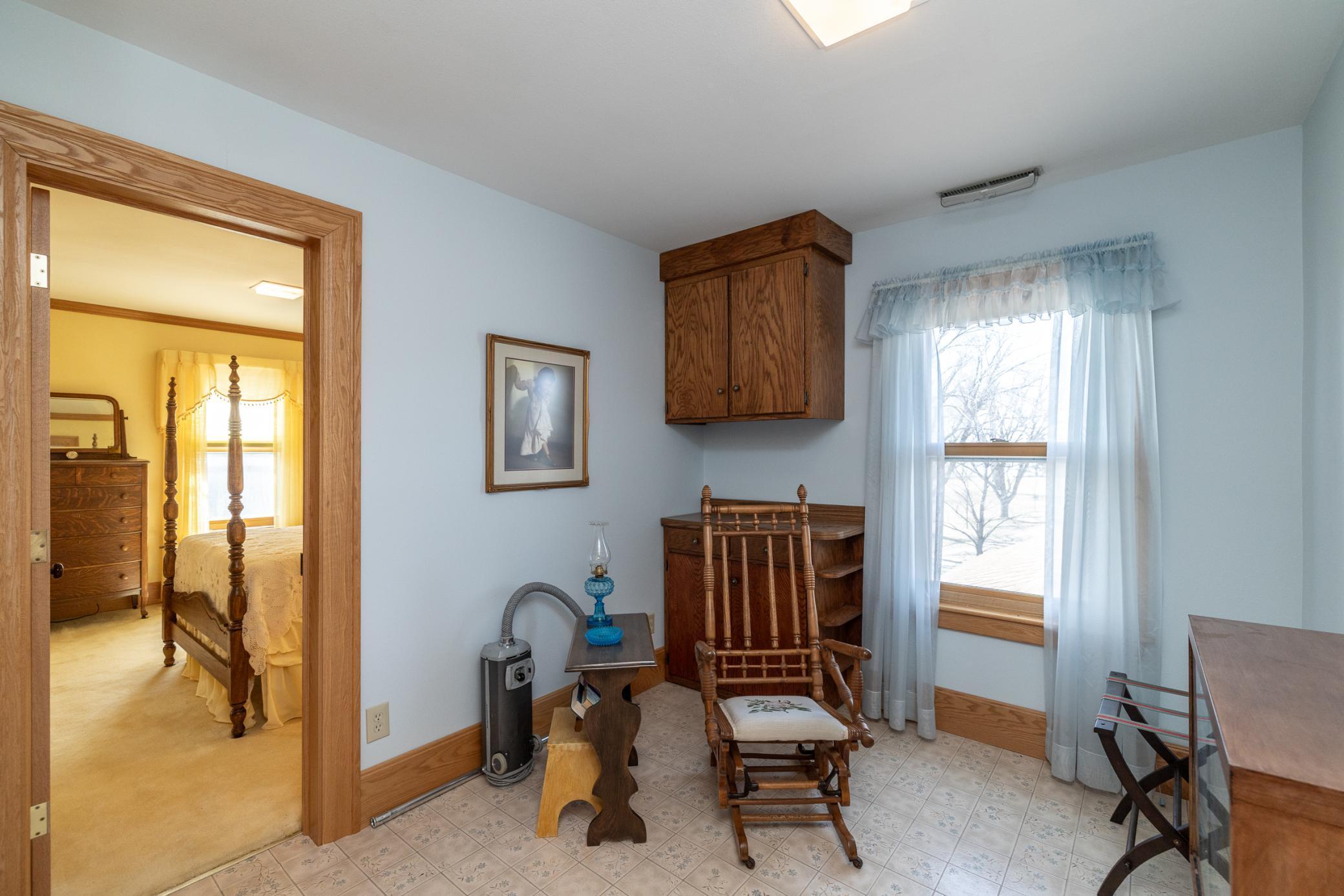 This upper level "bonus room" could be used for office space, den or storage