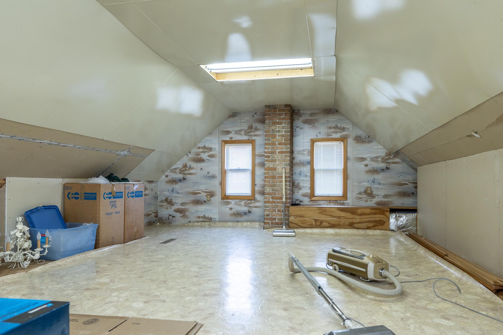 Bring your ideas for this spacious 40 15 third floor walk up attic space.