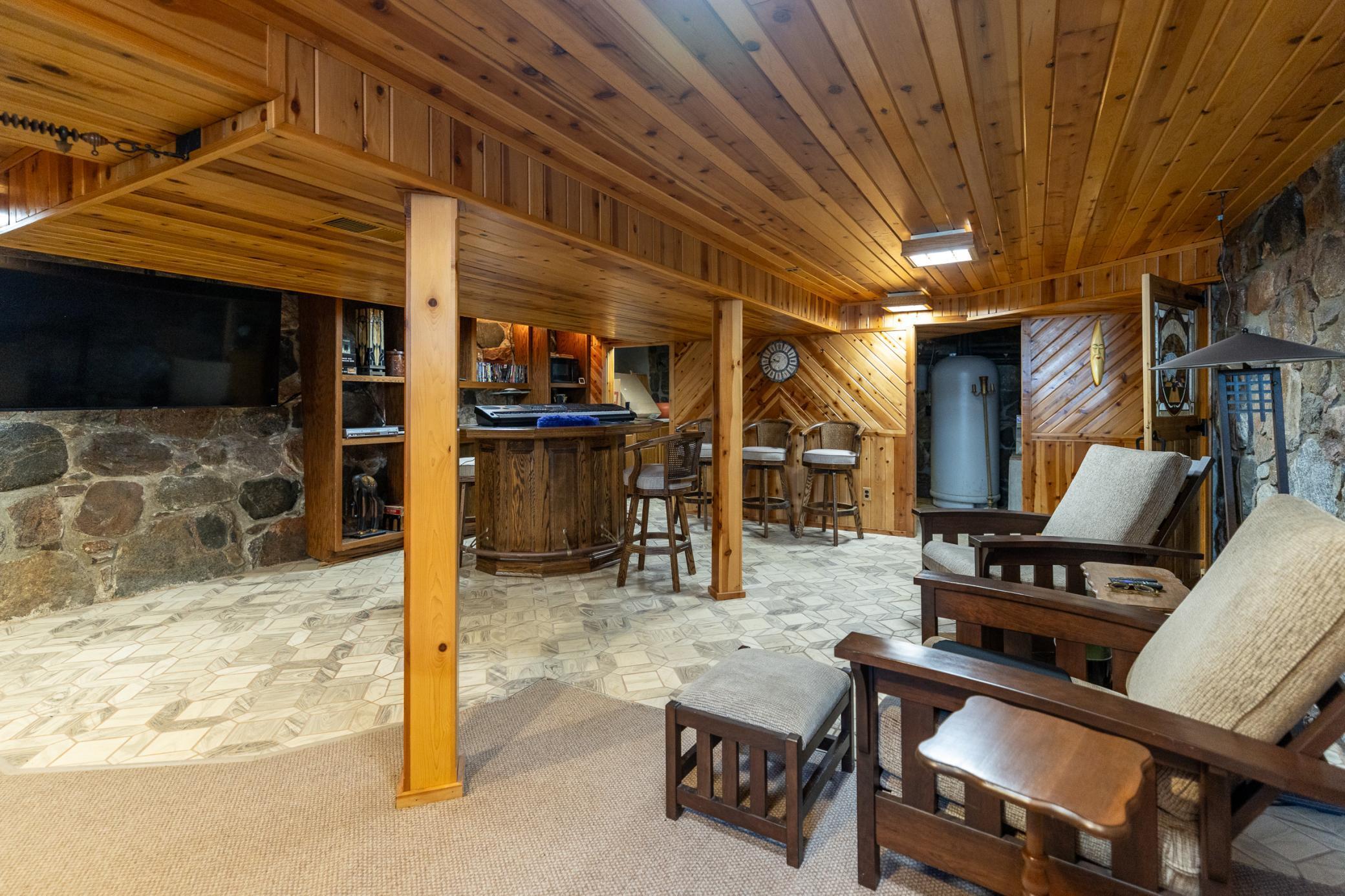 Plenty of room for additional furniture to sit and relax while watching the big screen TV