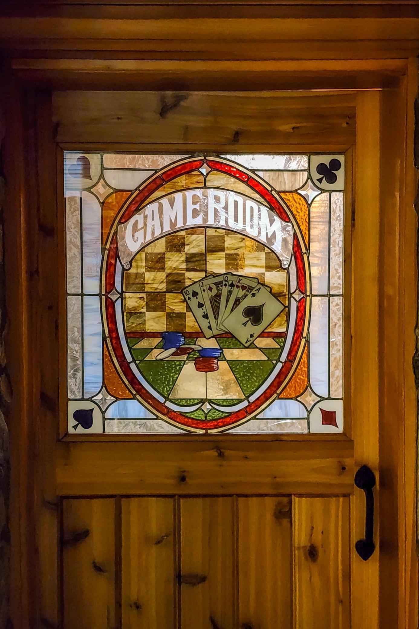 Custom made Stain Glass door from Montana that leads to stunning game room/family room