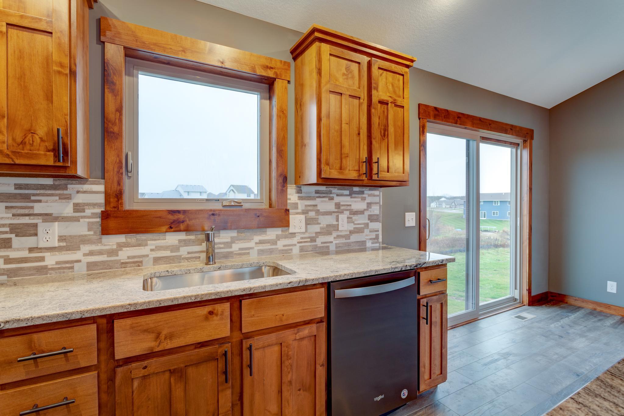 Photos are of a previously completed home with similar design and features. Actual selections, finishes, and materials may vary based on buyer choices and availability.