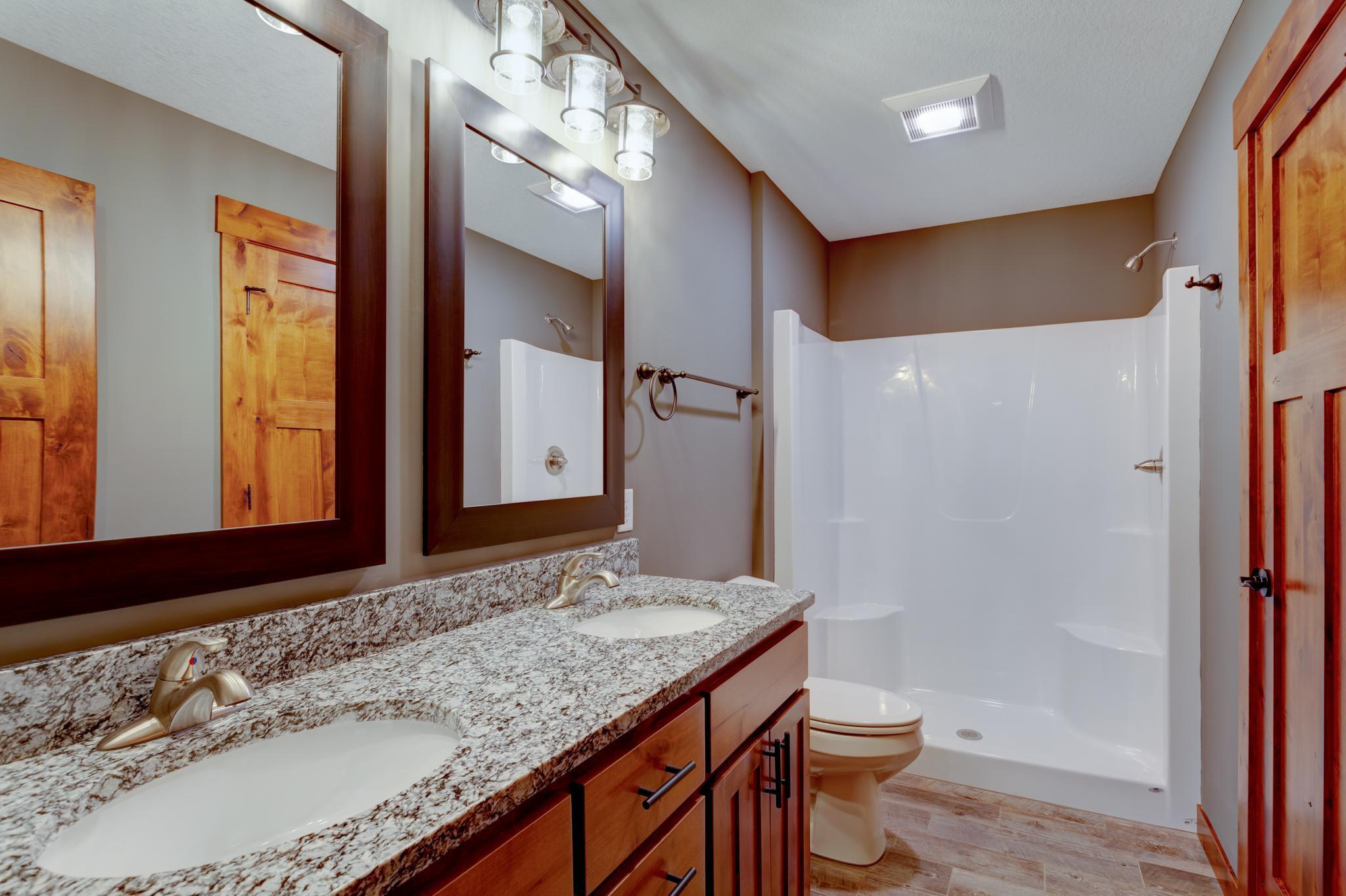 Photos are of a previously completed home with similar design and features. Actual selections, finishes, and materials may vary based on buyer choices and availability.