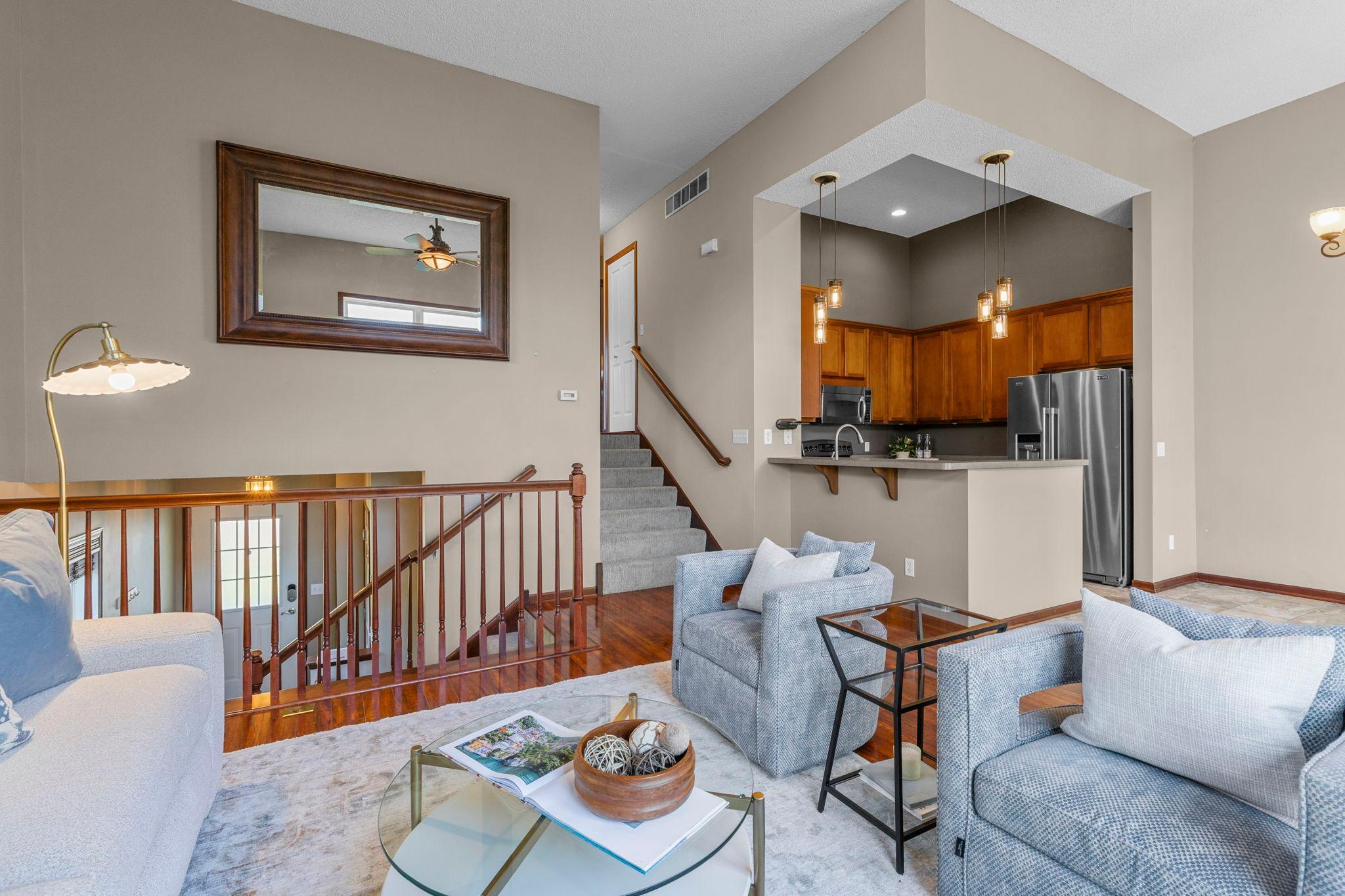 Open floor plan to kitchen and dining