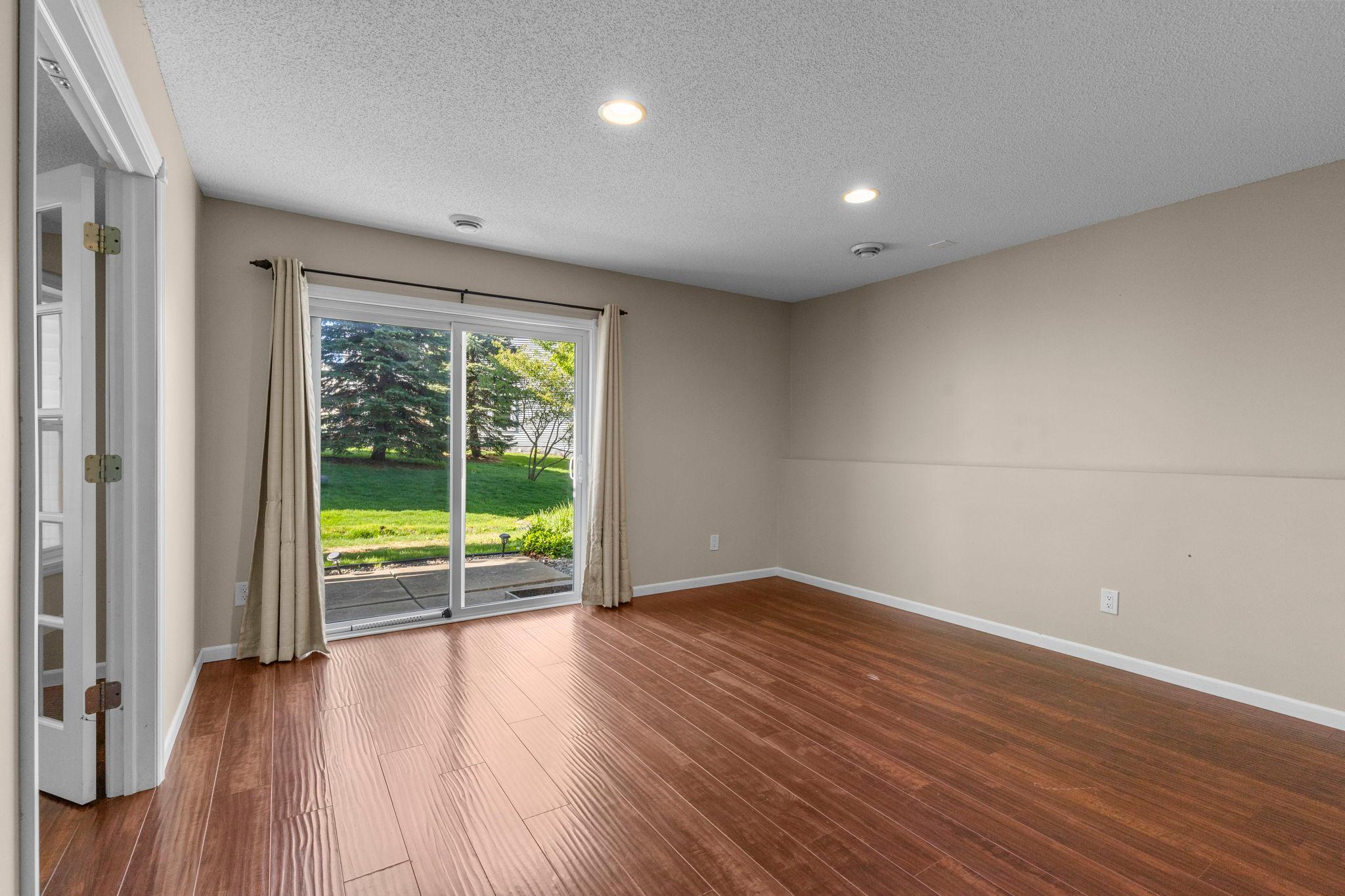 Walk-out to lower concrete patio and yard