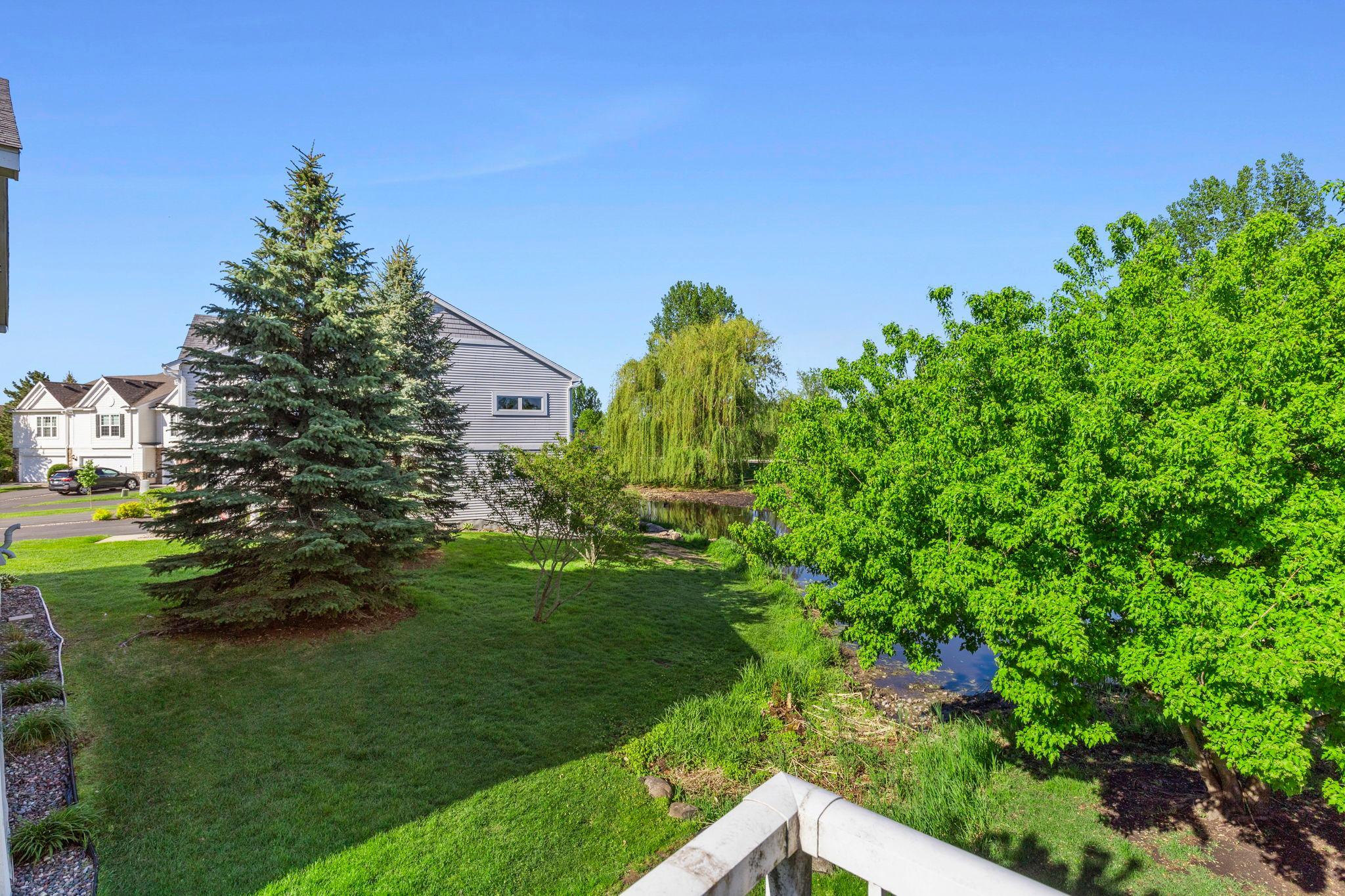This particular end unit faces open space and a pond, really giving it some nice privacy compared to others