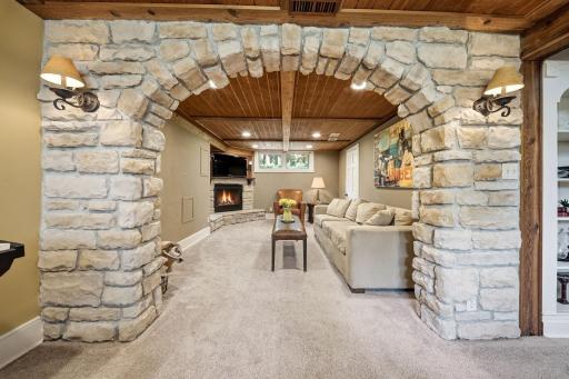 Updated Lower Level w/ Gorgeous Custom Brickwork