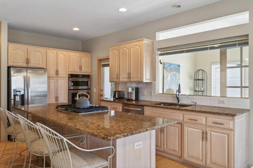Large kitchen with window into the 4 season porch
