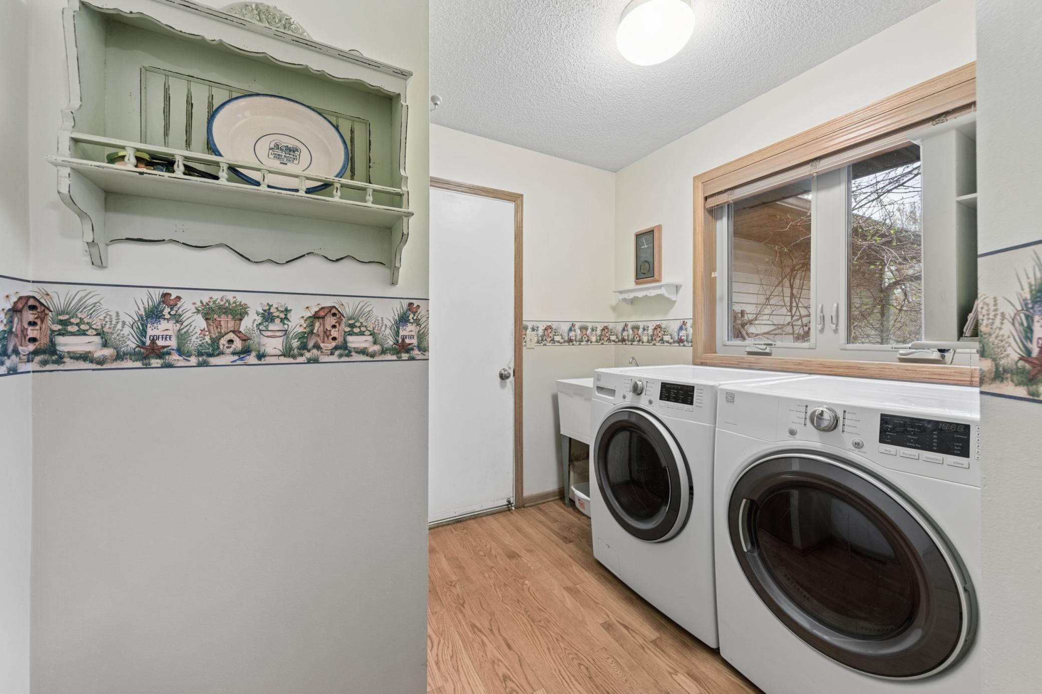 Laundry and mudroom with access to the 3-car garage.