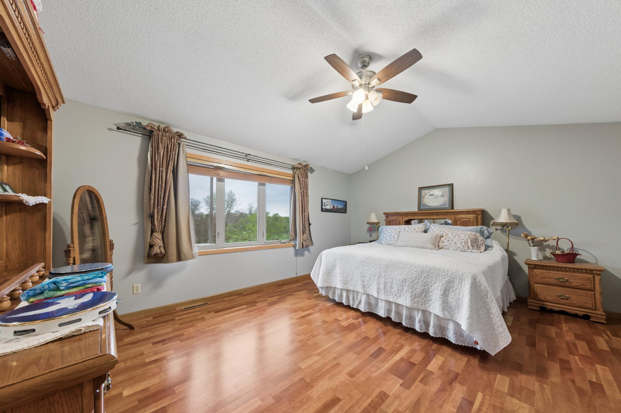 The upper-level primary suite is very spacious 17x13! True hardwood floors.