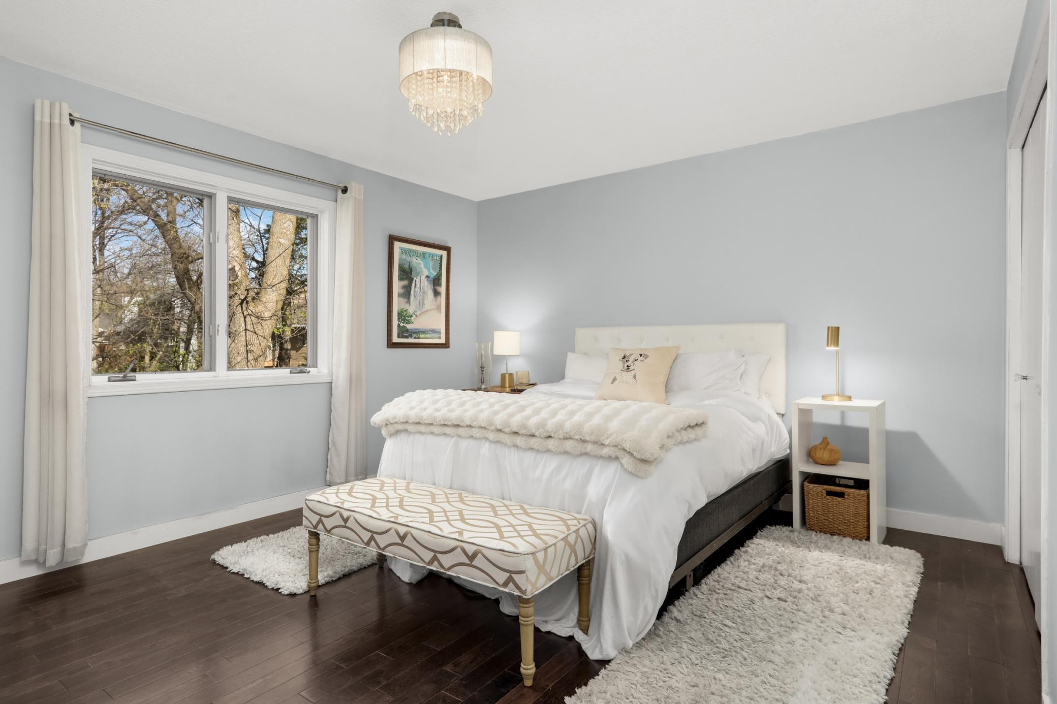 Primary bedroom with beautiful wood floors