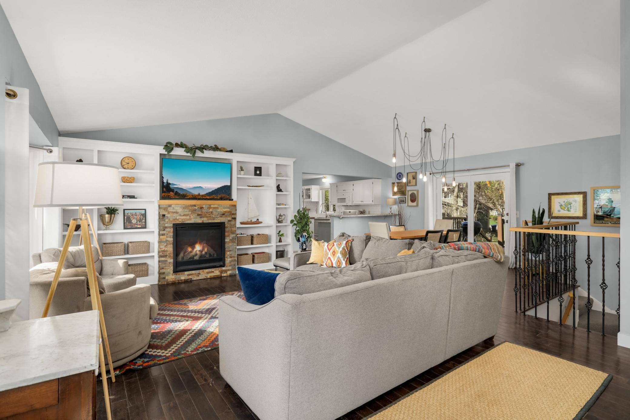 Main level entertainment center with fireplace