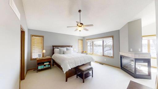 Primary suite featuring sitting area, walk in closet and full private bath.