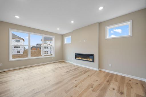Family Room Open and Spacious with Large Picture Windows